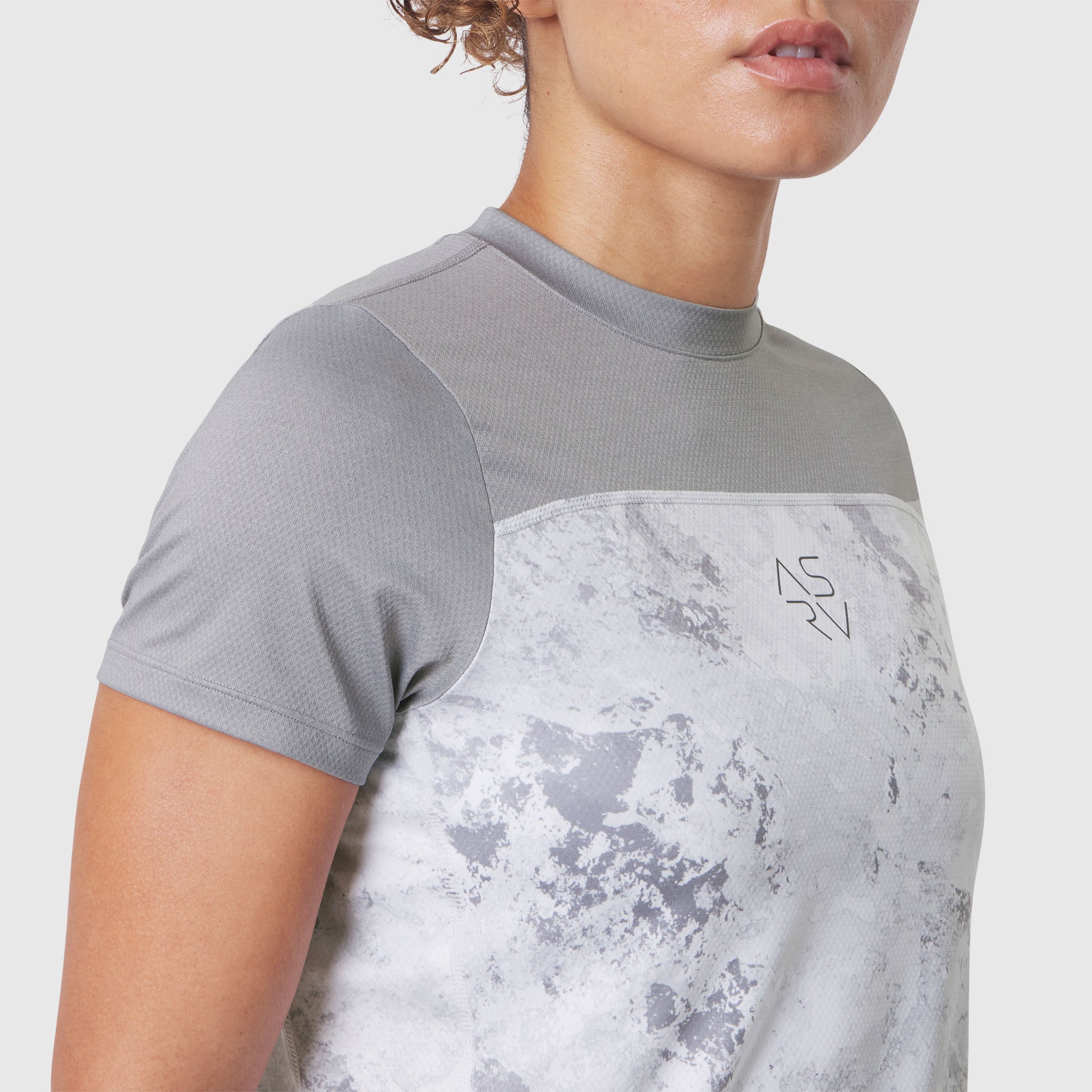 W086 AEROSILVER® UPF50+ Run Tee in Sedona Snow Camo, side view on model