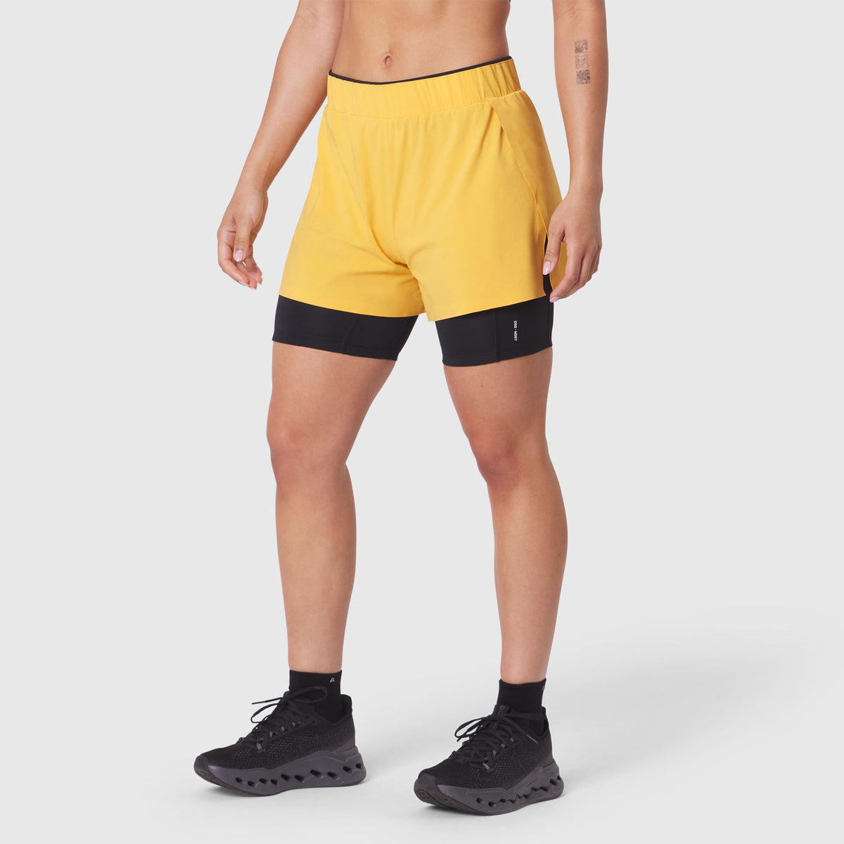 W087 Aerotex Side Split Liner Short in Amber, front view on model