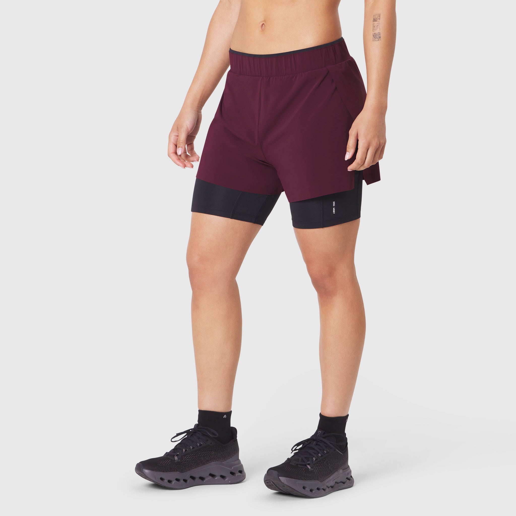 W087 Aerotex™ Side Split Liner Short in Merlot, front view on model