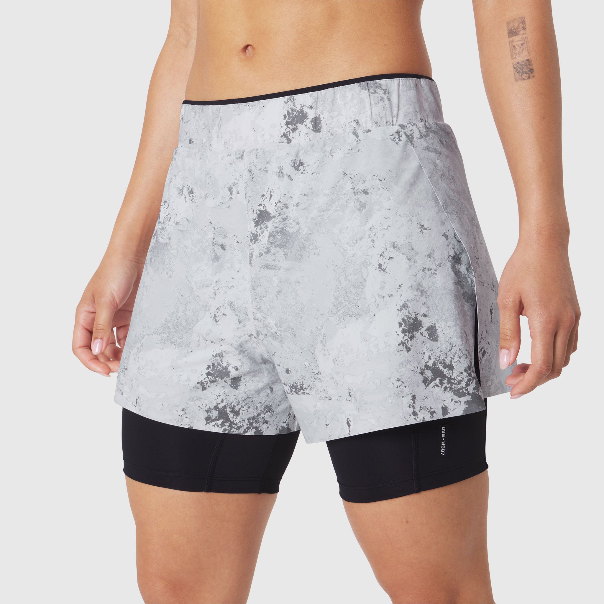 W087 Aerotex Side Split Liner Short in Sedona Snow Camo, worn by model, back view