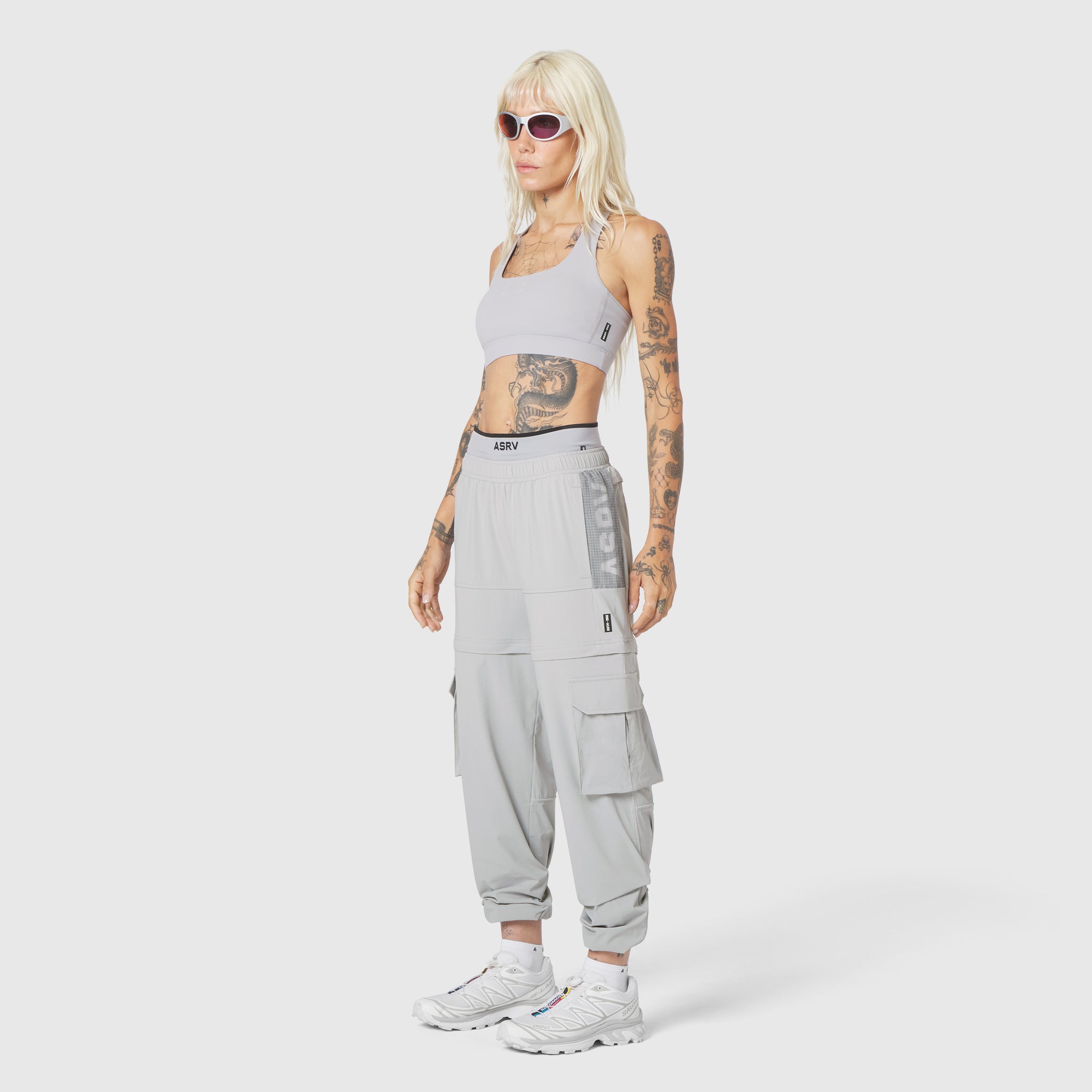 W096 LYCRA® ADAPTIV Racerback Sports Bra in Slate Grey, front view on model