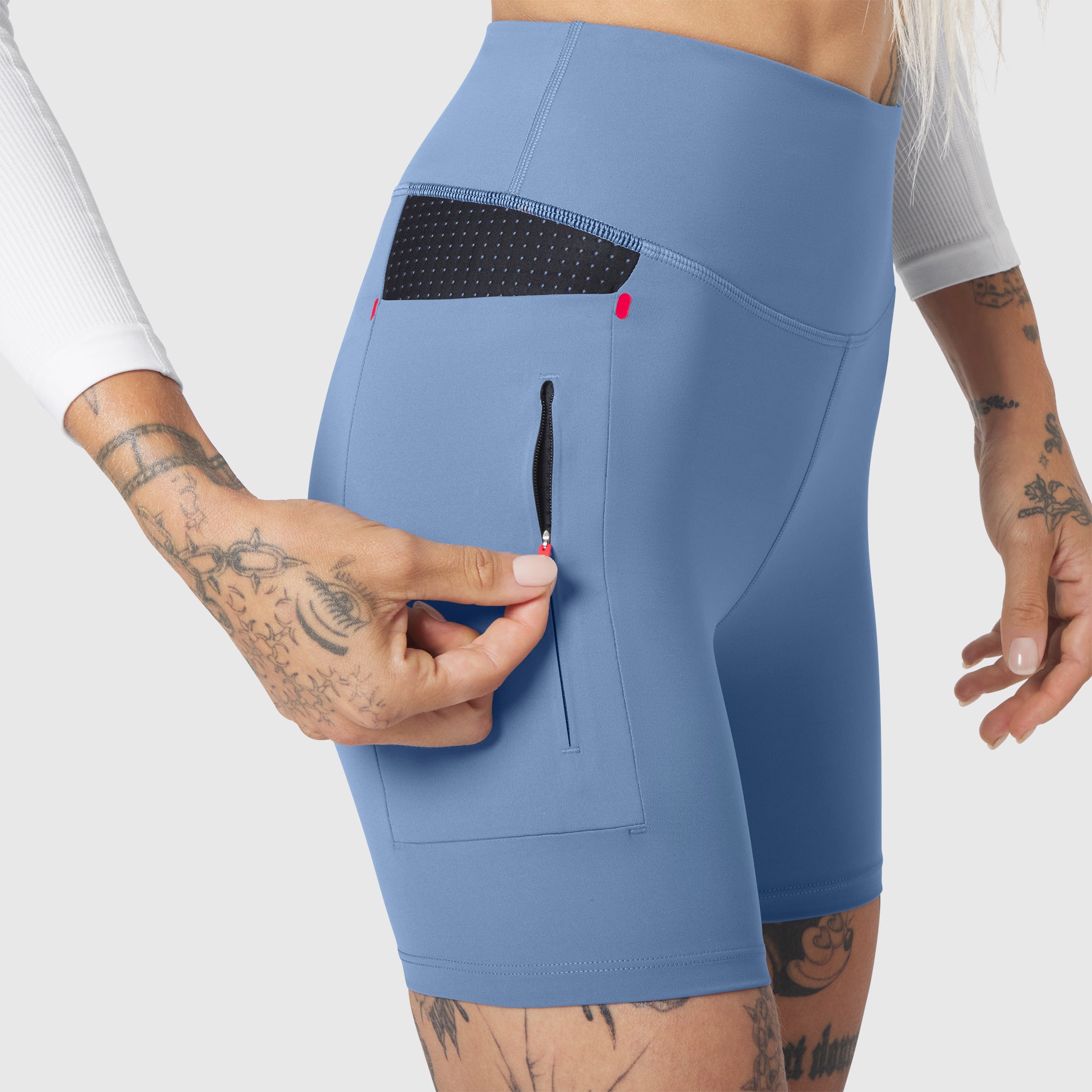 W099 LYCRA® ADAPTIV Hybrid Bike Short in Slate Blue, worn model showcasing pocket details