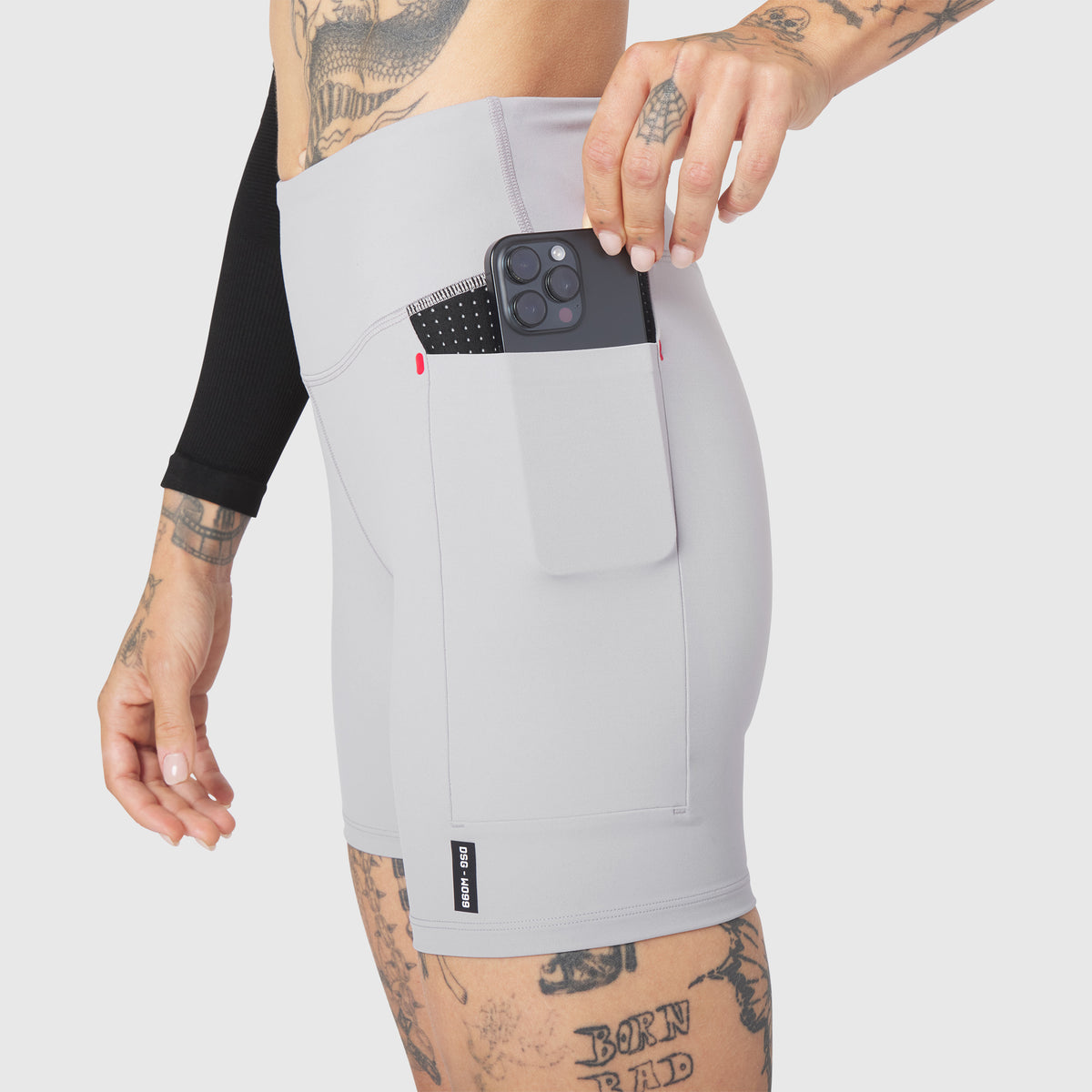 W099 LYCRA® ADAPTIV Hybrid Bike Short in Slate Grey, worn with phone in pocket