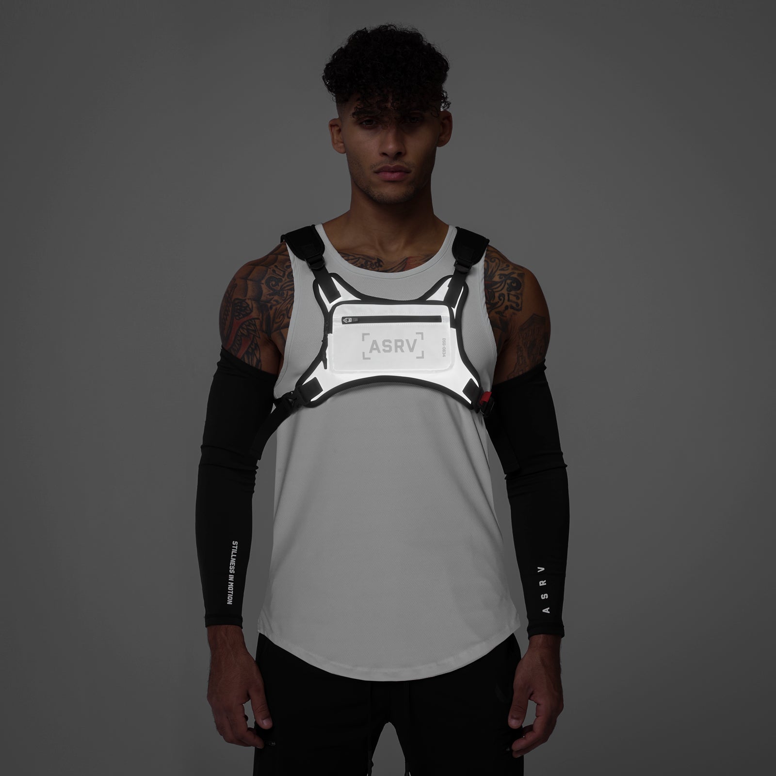 0634 Conditioning Chest Pack in grey reflective, worn on model front view