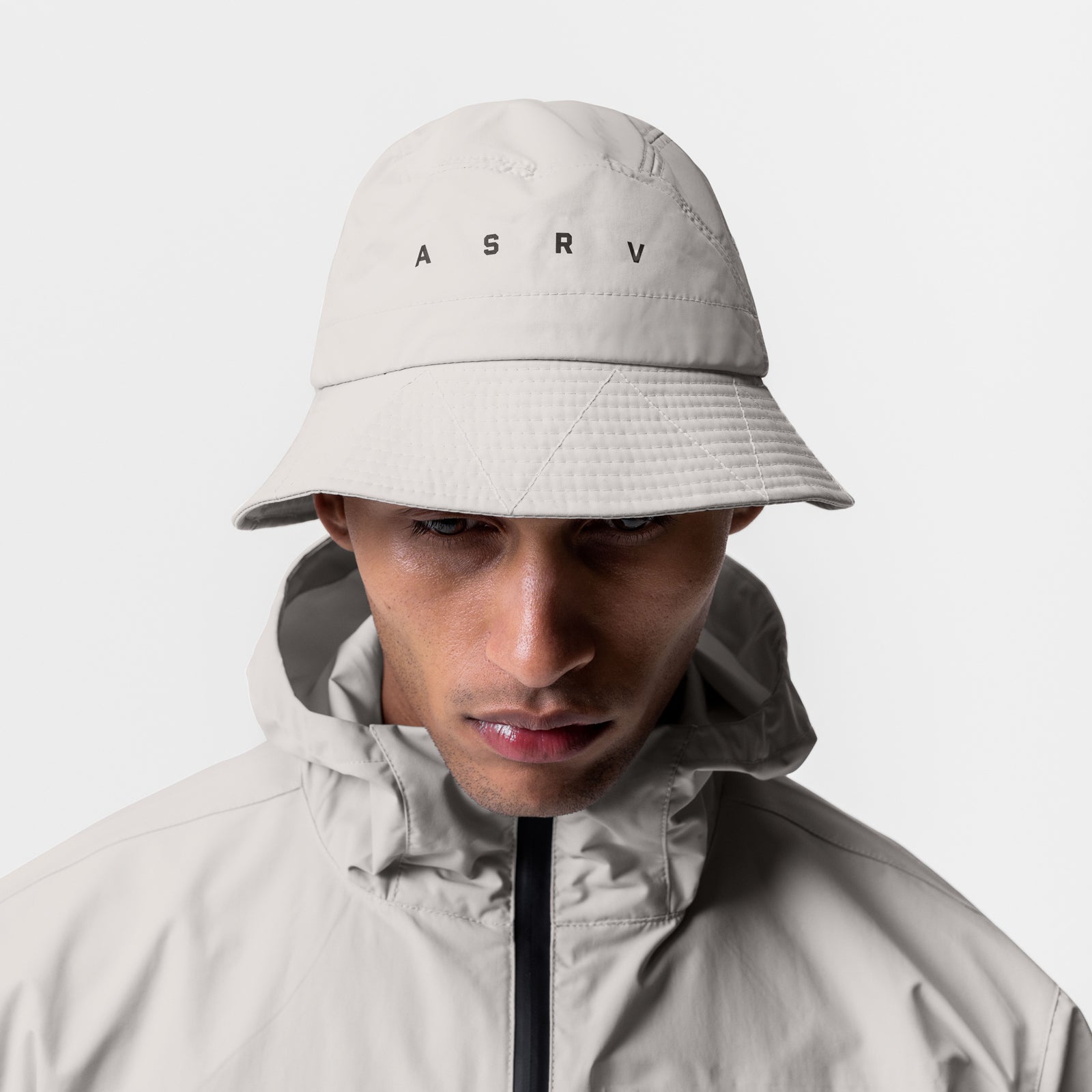 Hipora® Bucket Hat in Stone worn by model, front view
