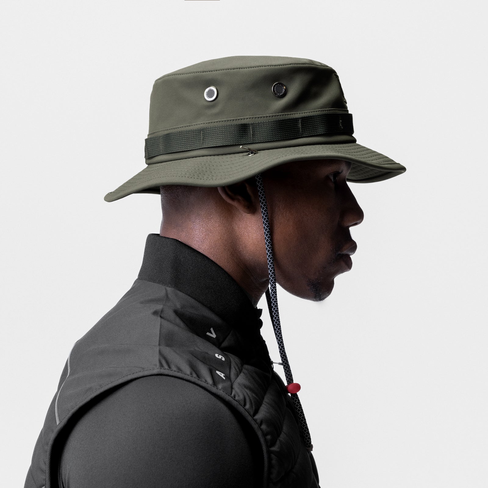 Waterproof Vented Boonie Hat in Dark Olive, side profile worn by model