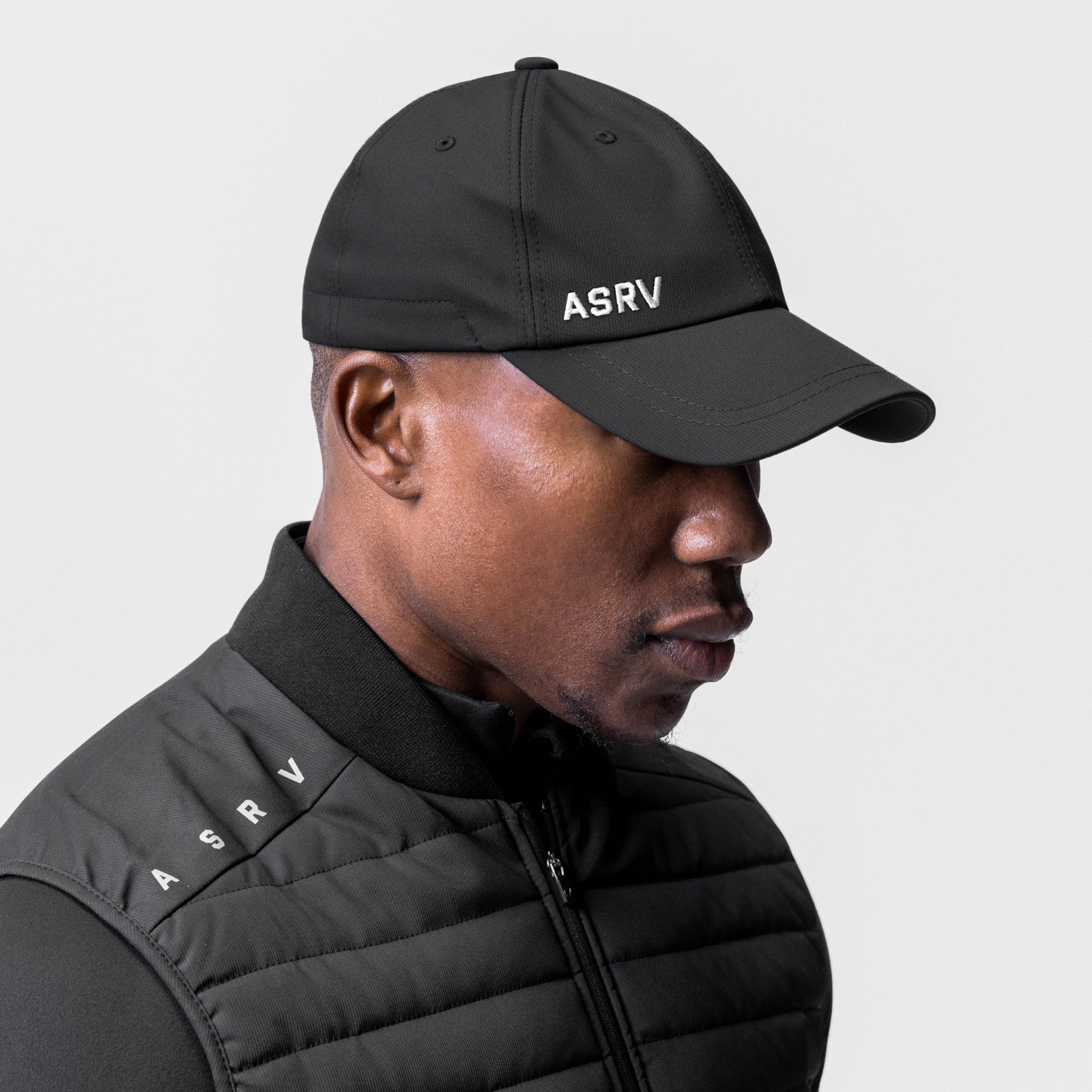 SilverPlus™ Cinch Hat in black, worn by model in side profile view