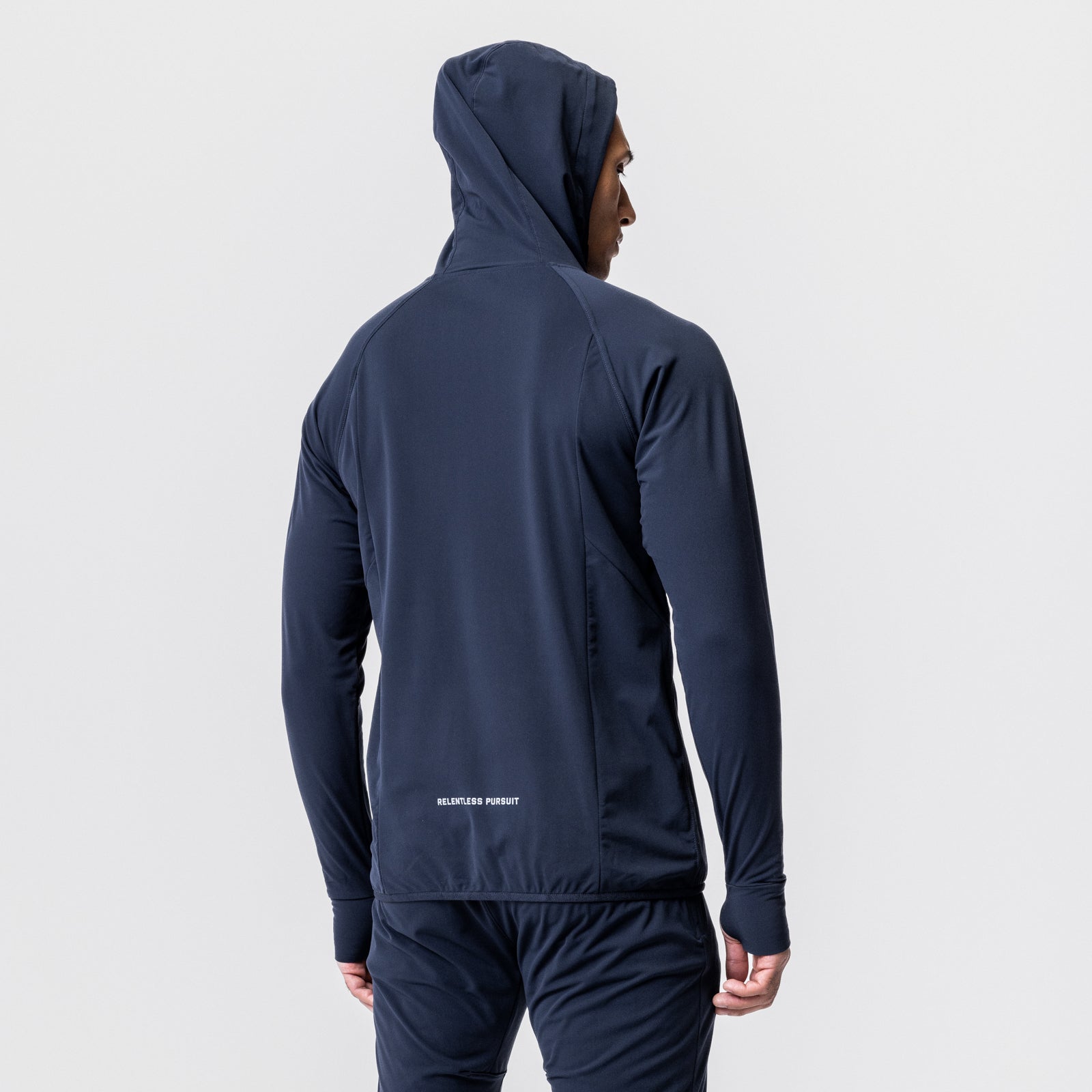 Navy training hoodie on model, back view with hood up