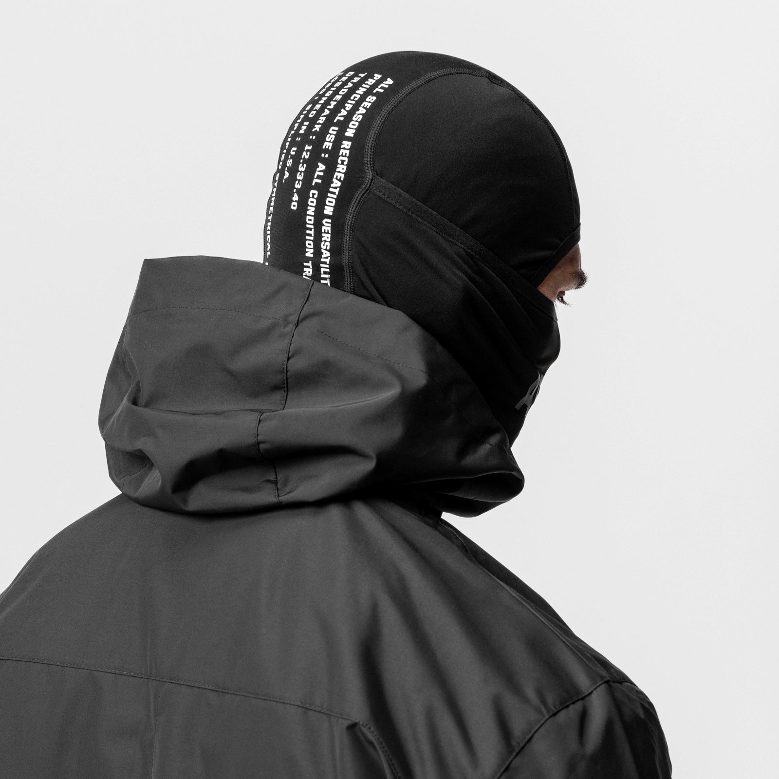 Thermal Balaclava in black, worn by model from back view