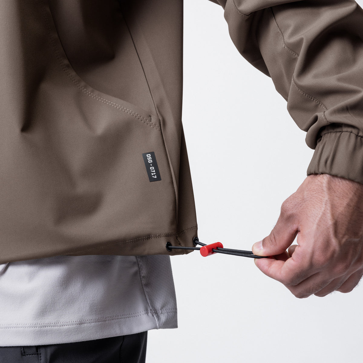 Weather-Ready Anorak Jacket in Deep Taupe, model demonstrating adjustable drawstring detail