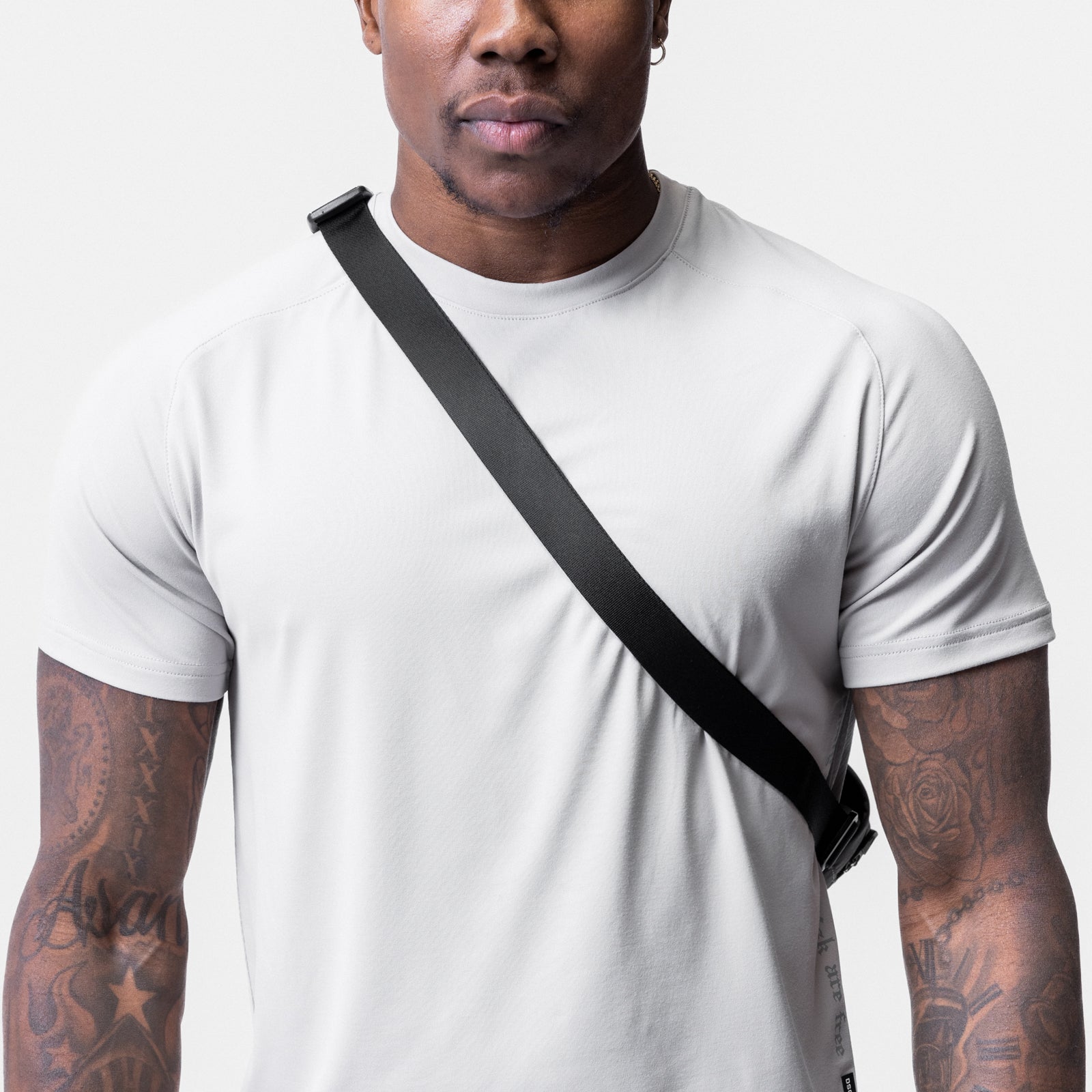 Cordura® Tech Crossbody Pack in black, worn across chest on model