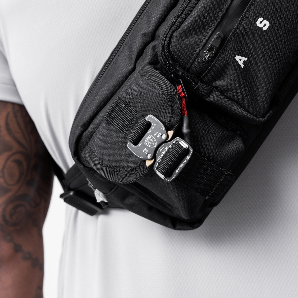 0703 Cordura Tech Crossbody Pack in black, worn across chest