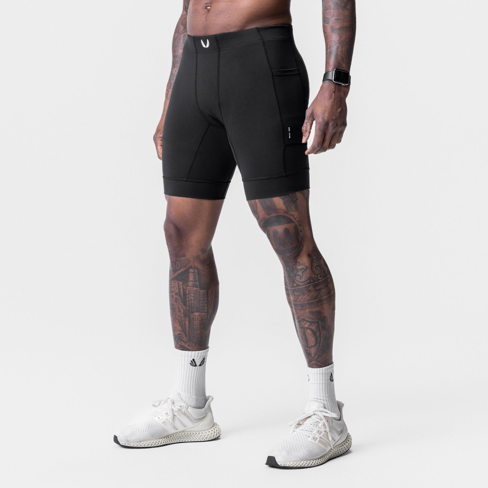 Black WarpFlexx® Side Pocket 1/2-Length Legging on model, front view