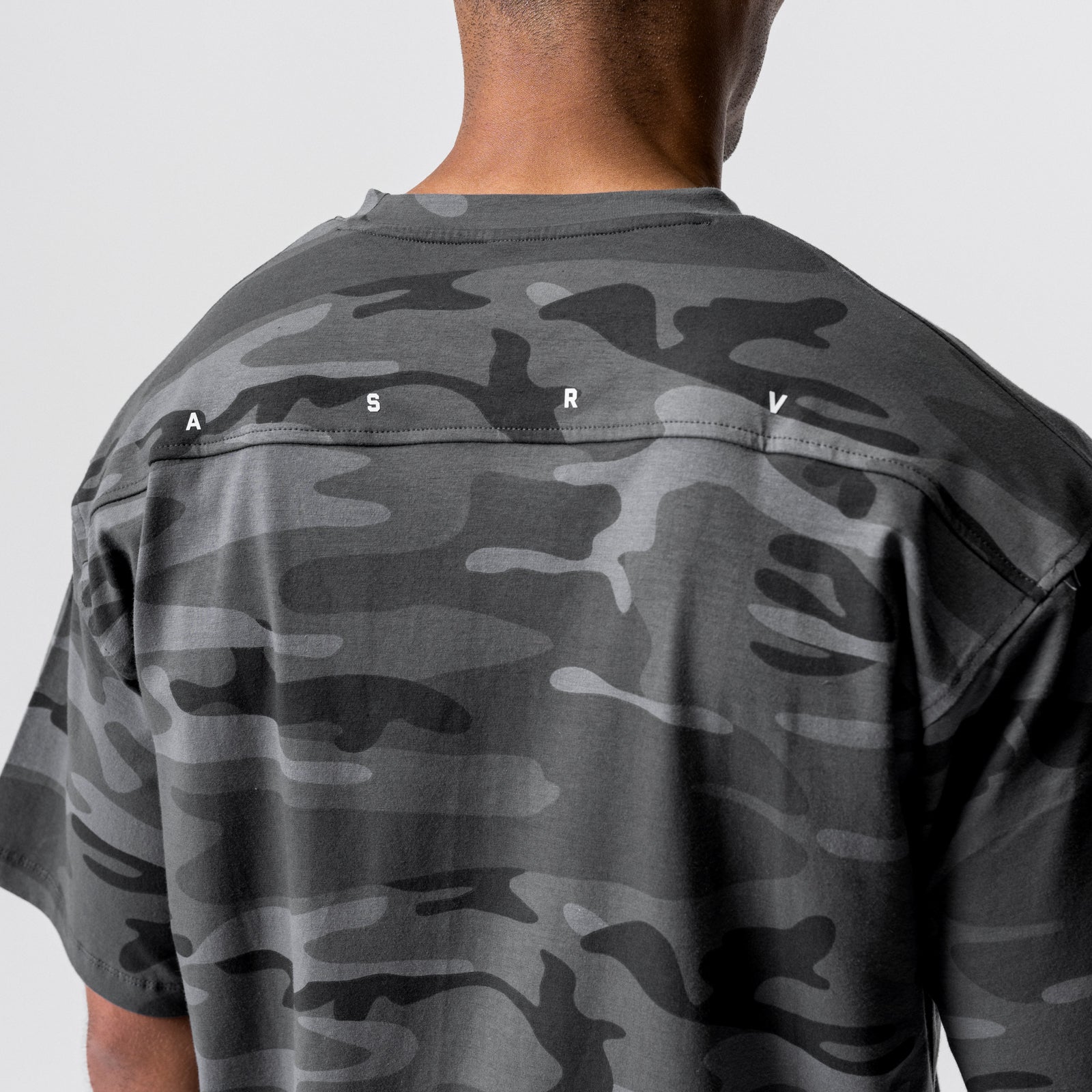 CottonPlus™ Oversized Tee in black camo, back view on model with measurement points