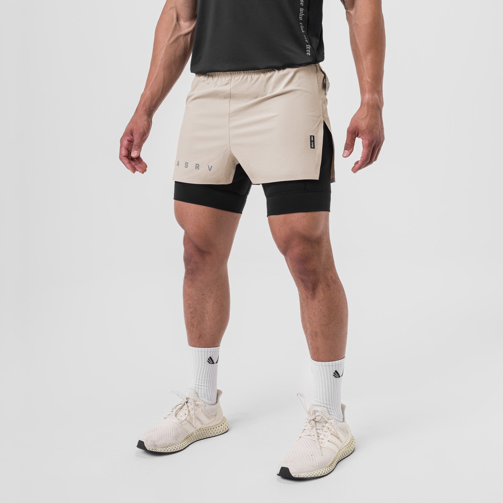 Ripstop 3" High Split Liner Short in Chai and Black, worn by model, front view