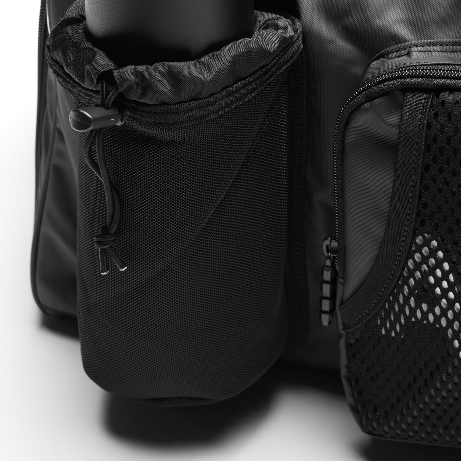 Flatlay Waterproof 2-in-1 Travel Duffle in black, detail view