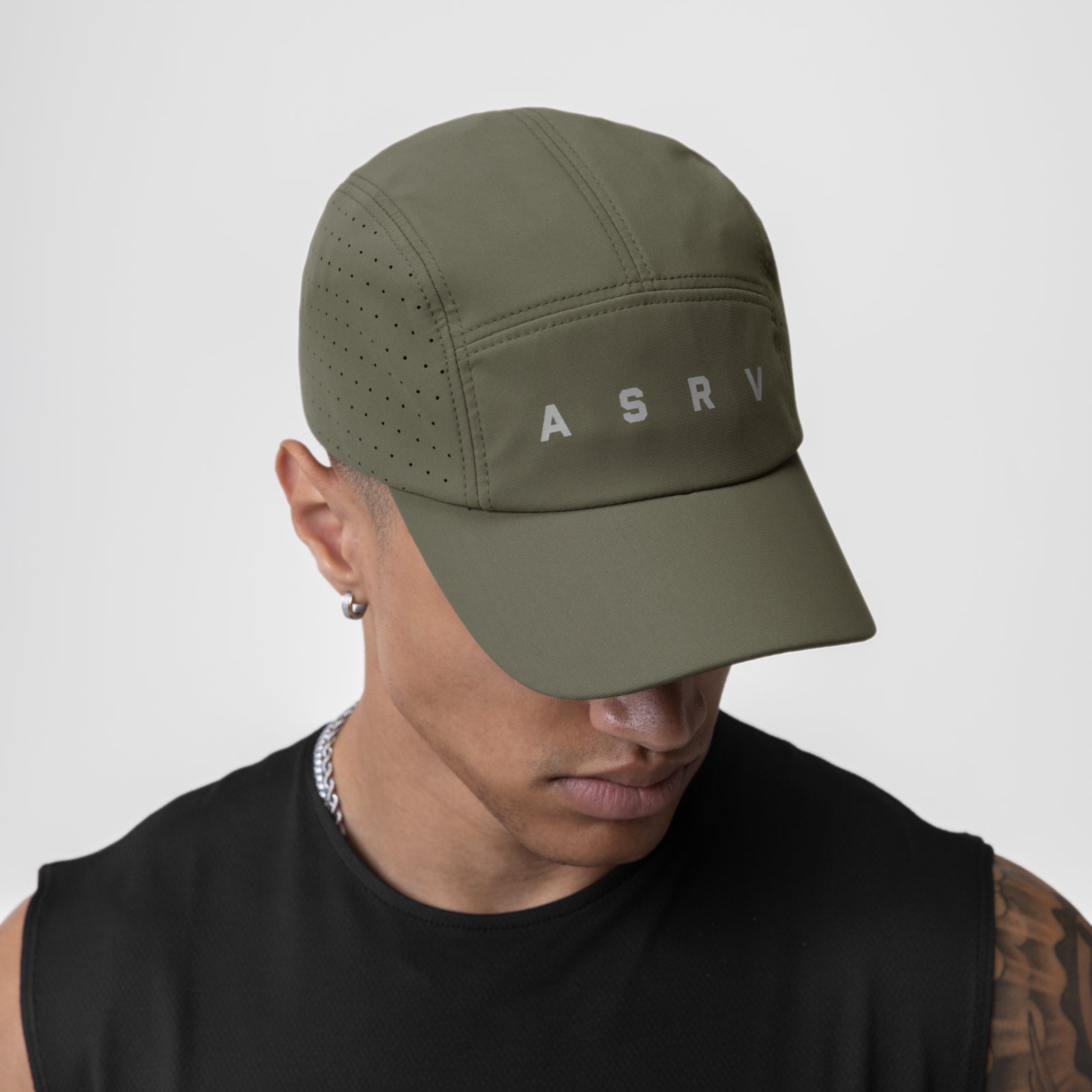 Tetra-Lite Lightweight Vented Hat in olive, worn by model, side view