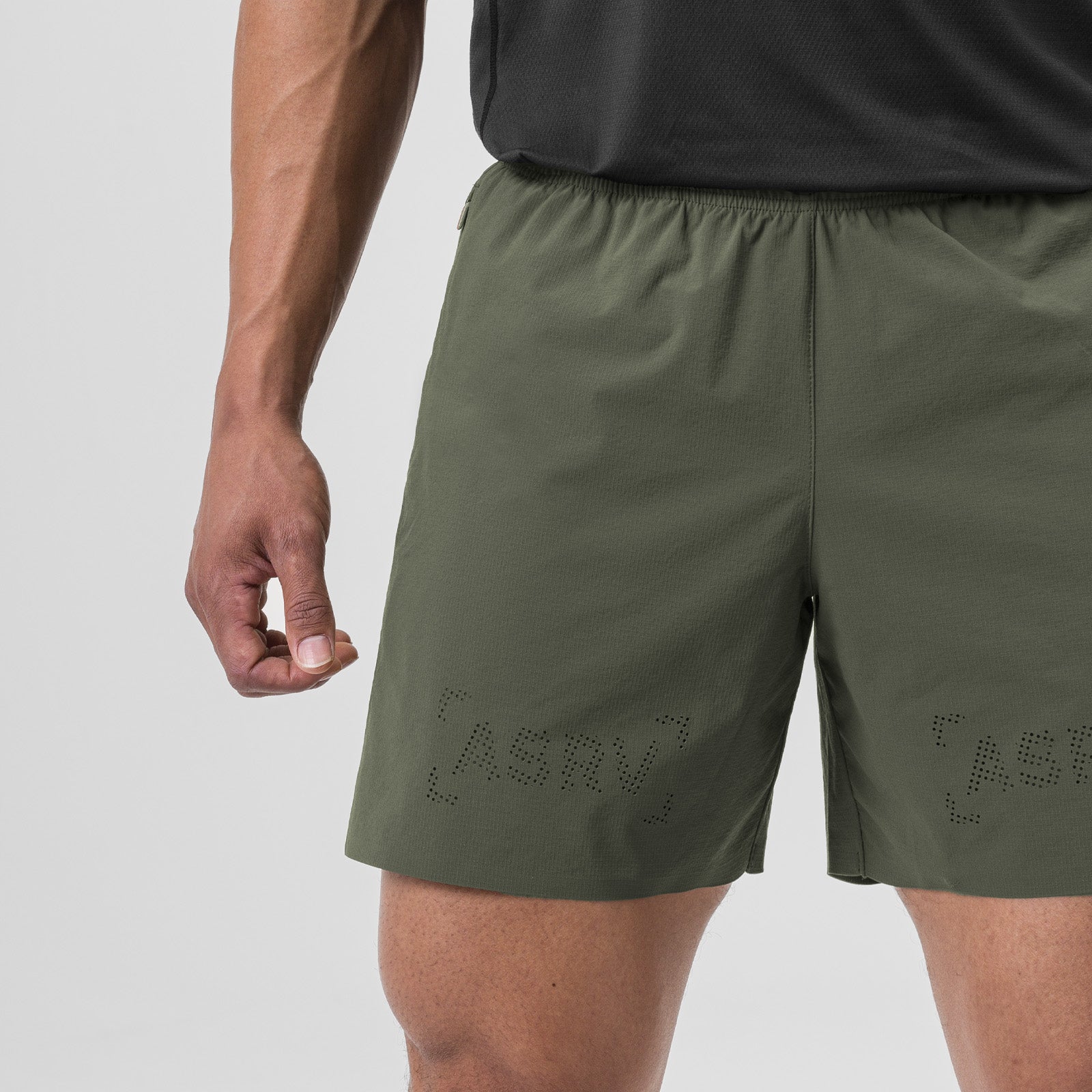 Ripstop 6" Perforated Short in olive worn by model, side view