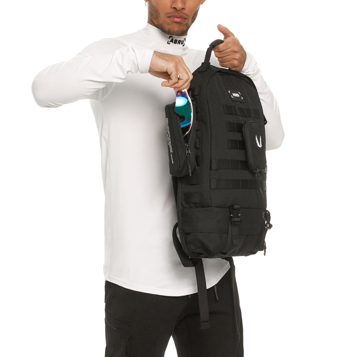 0275 Modular Everyday Pack in black, worn and carried by model