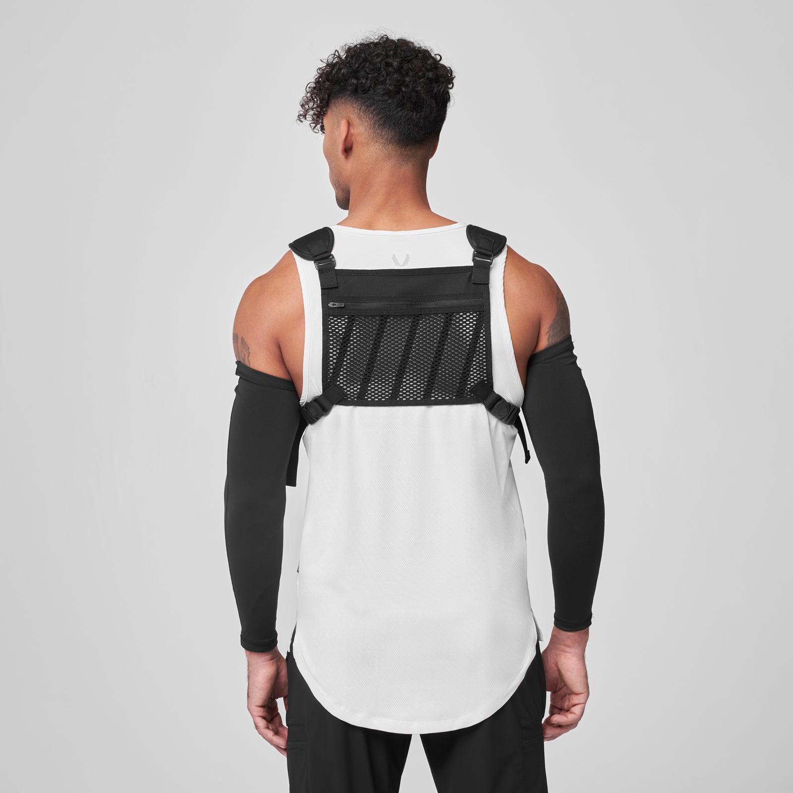 0634 Conditioning Chest Pack in black and white, back view on model