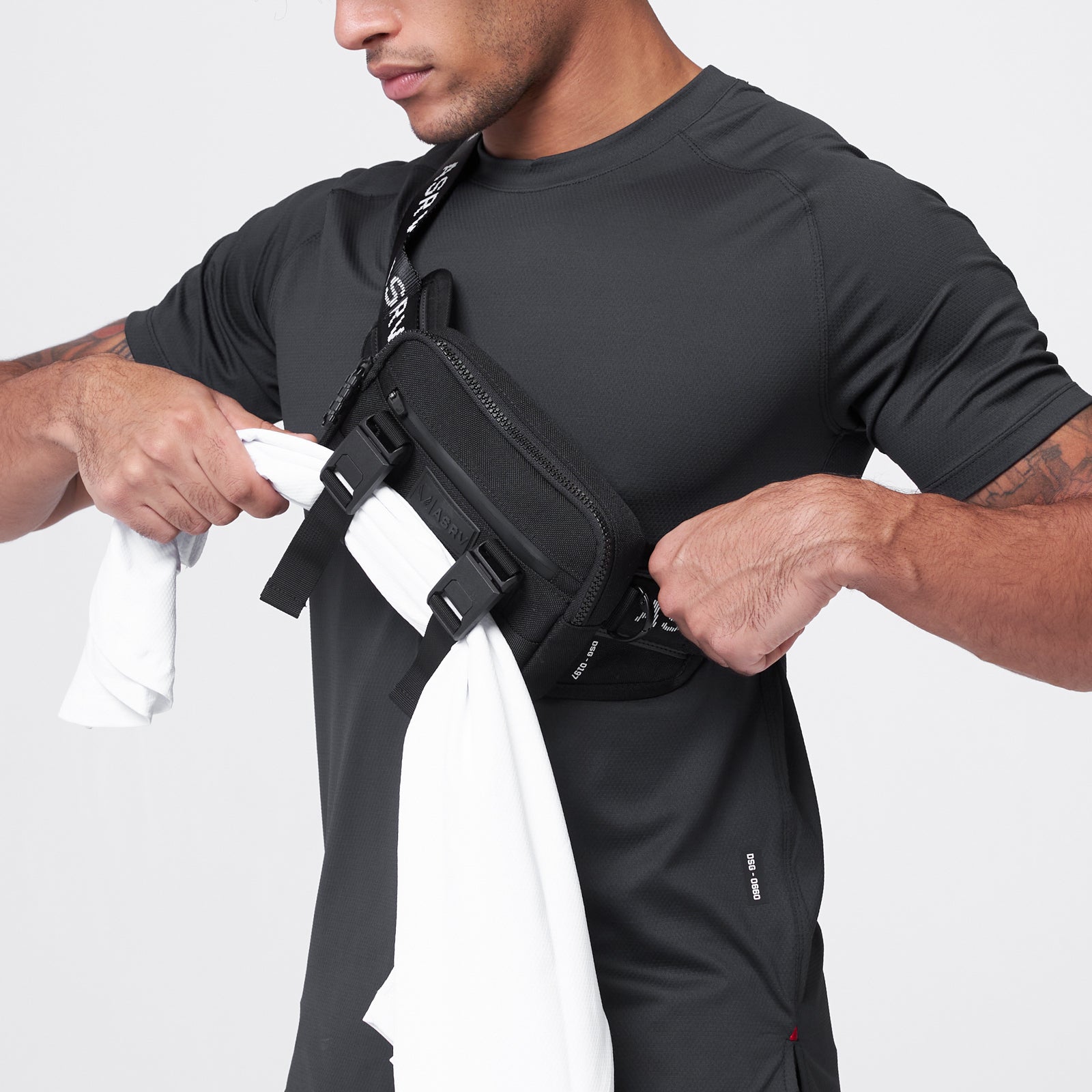 0197 Waterproof Cordura® Small Crossbody Bag in black, worn and modeled by male