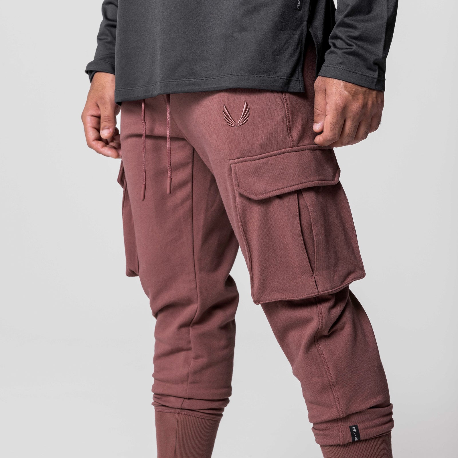 Tech-Terry Cargo High Rib Jogger in red earth, modeled from waist down showing cargo pockets