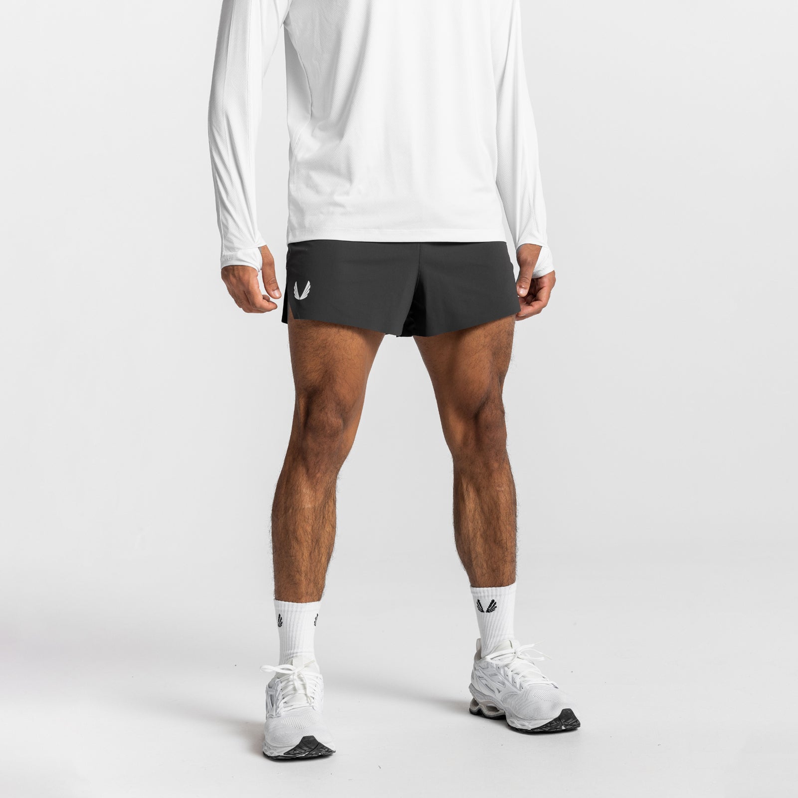 Tetra-Lite Laser Cut 3" Short in Space Grey, worn by model with white long-sleeve shirt and white sneakers