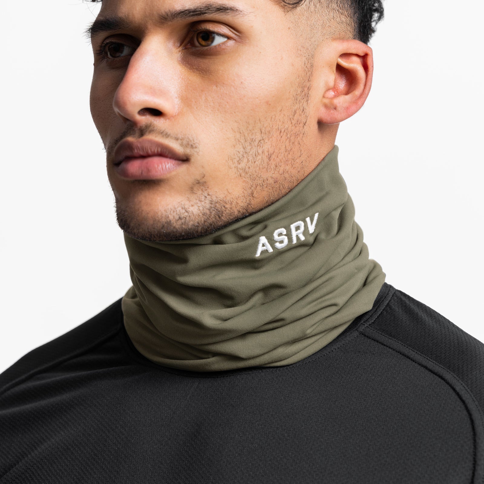 Thermal Gaiter in faded olive worn as neck gaiter, side profile view