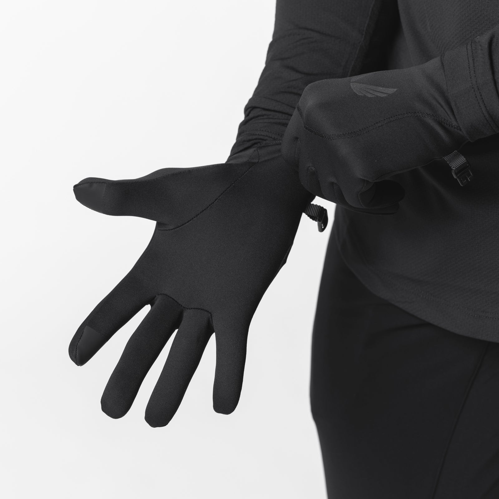 Aeroheat® Lightweight Gloves in black, worn on model's hand extended outward