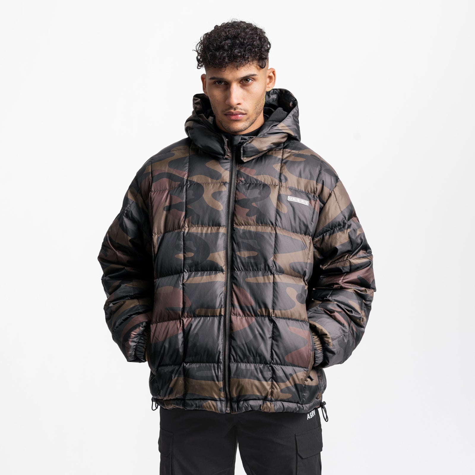 Weather-Ready Down Puffer Jacket in rust camo, worn by model, front view