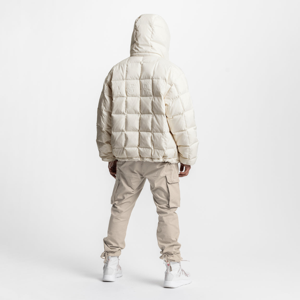 Weather-Ready Down Puffer Jacket in ivory cream, back view on model wearing beige cargo pants