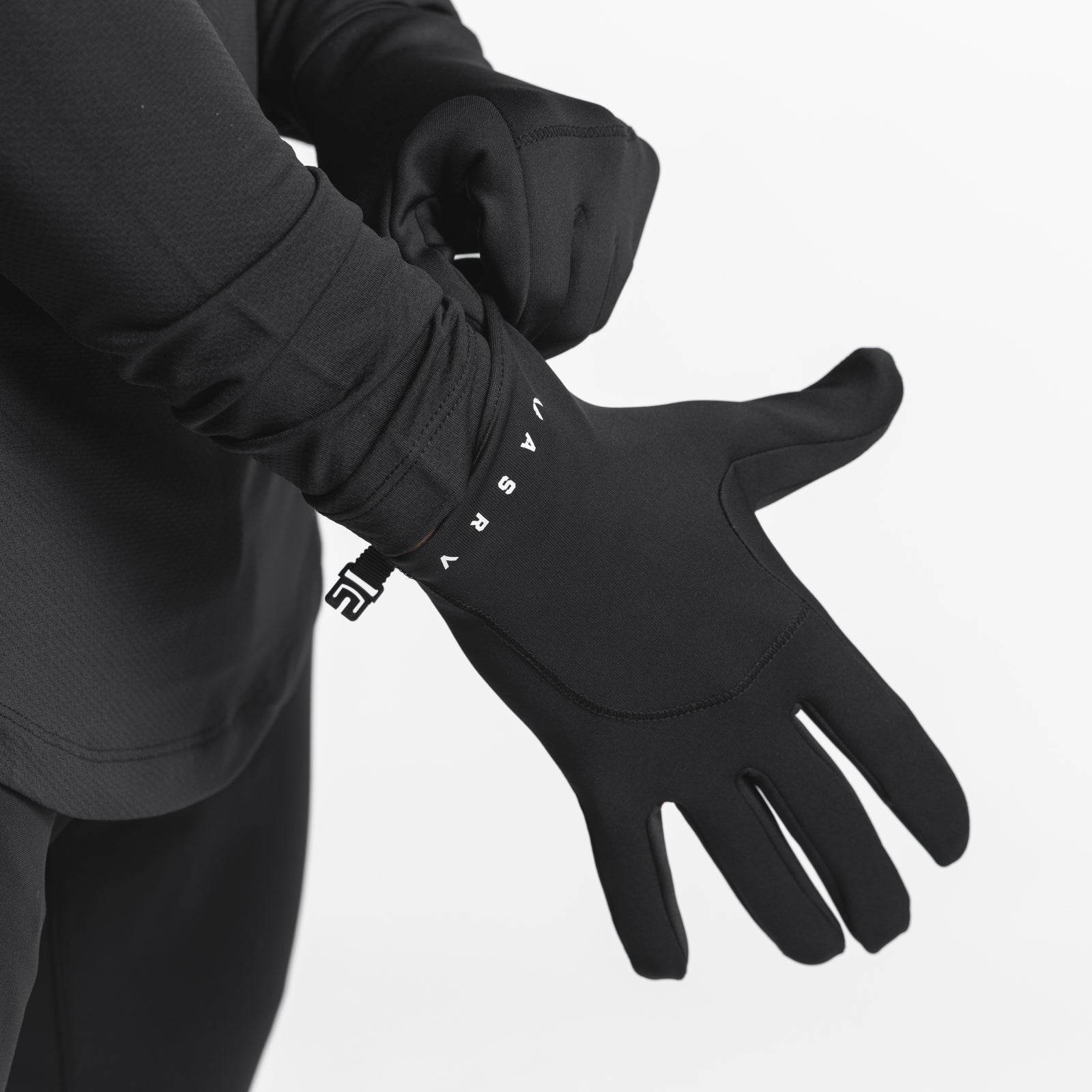 Aeroheat Lightweight Gloves in black with white stripe detail, worn on model's hands
