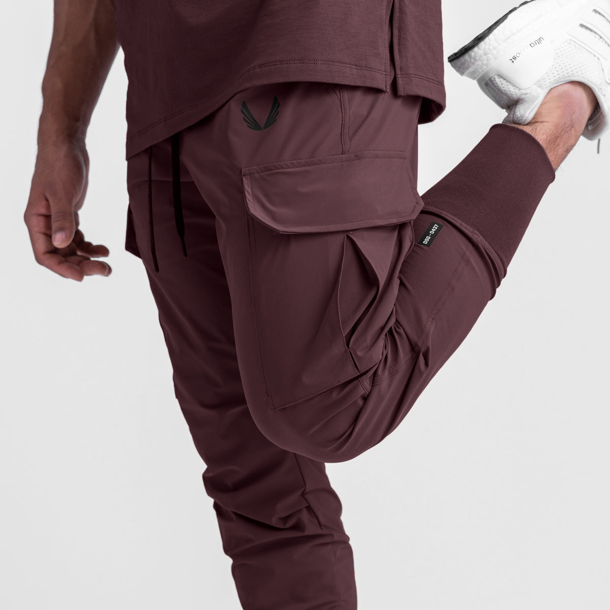 Tetra-Lite® Cargo High Rib Jogger in Faded Plum, worn by model showing cargo pocket and leg detail