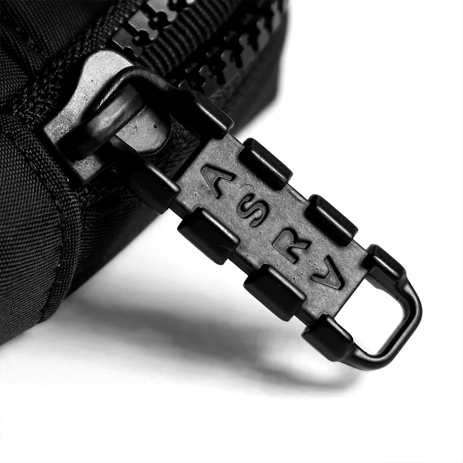 Flatlay MOLLE Crossbody Bag in black, buckle detail closeup