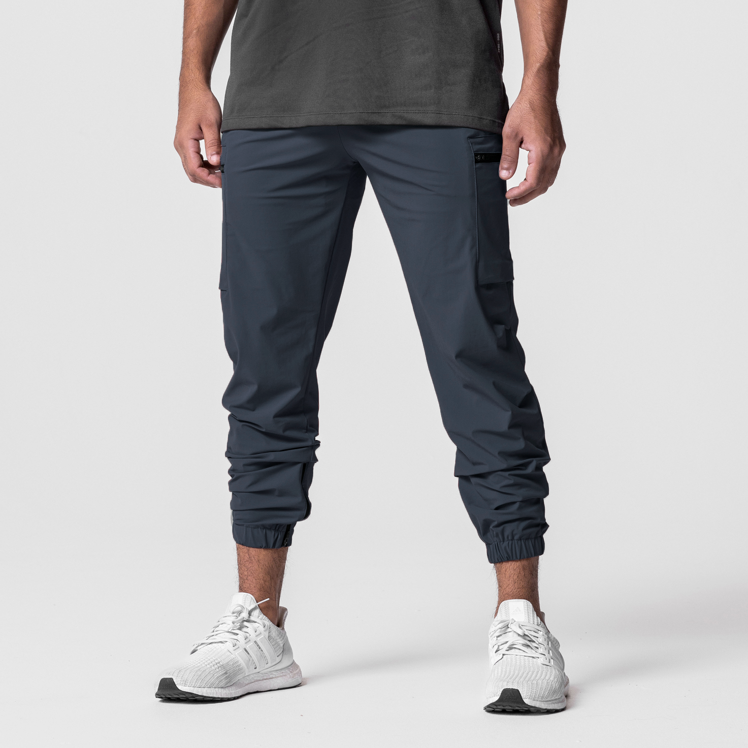 Tetra-Lite Standard Zip Jogger in navy worn by model, front view