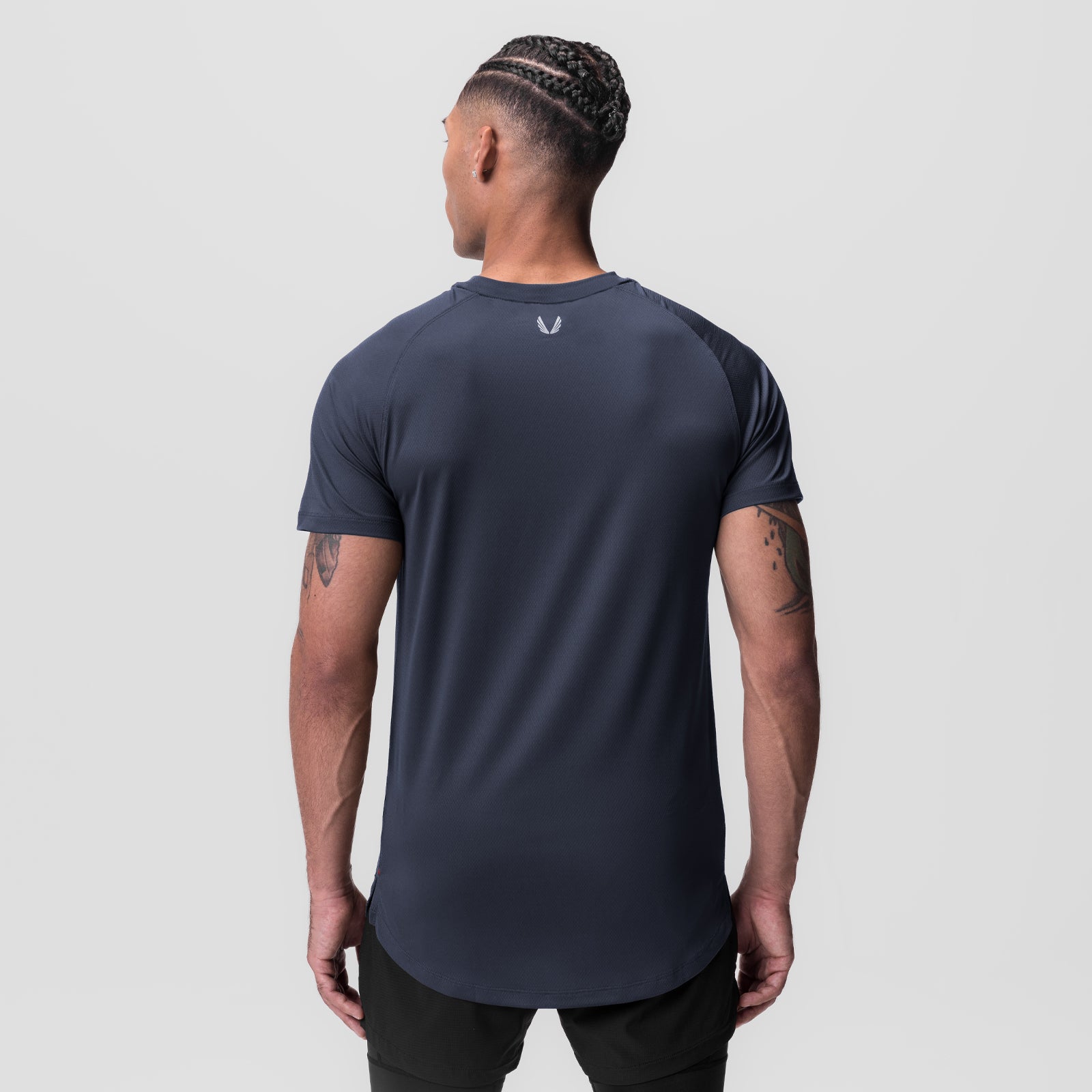AeroSilver Established Tee in navy, back view on model
