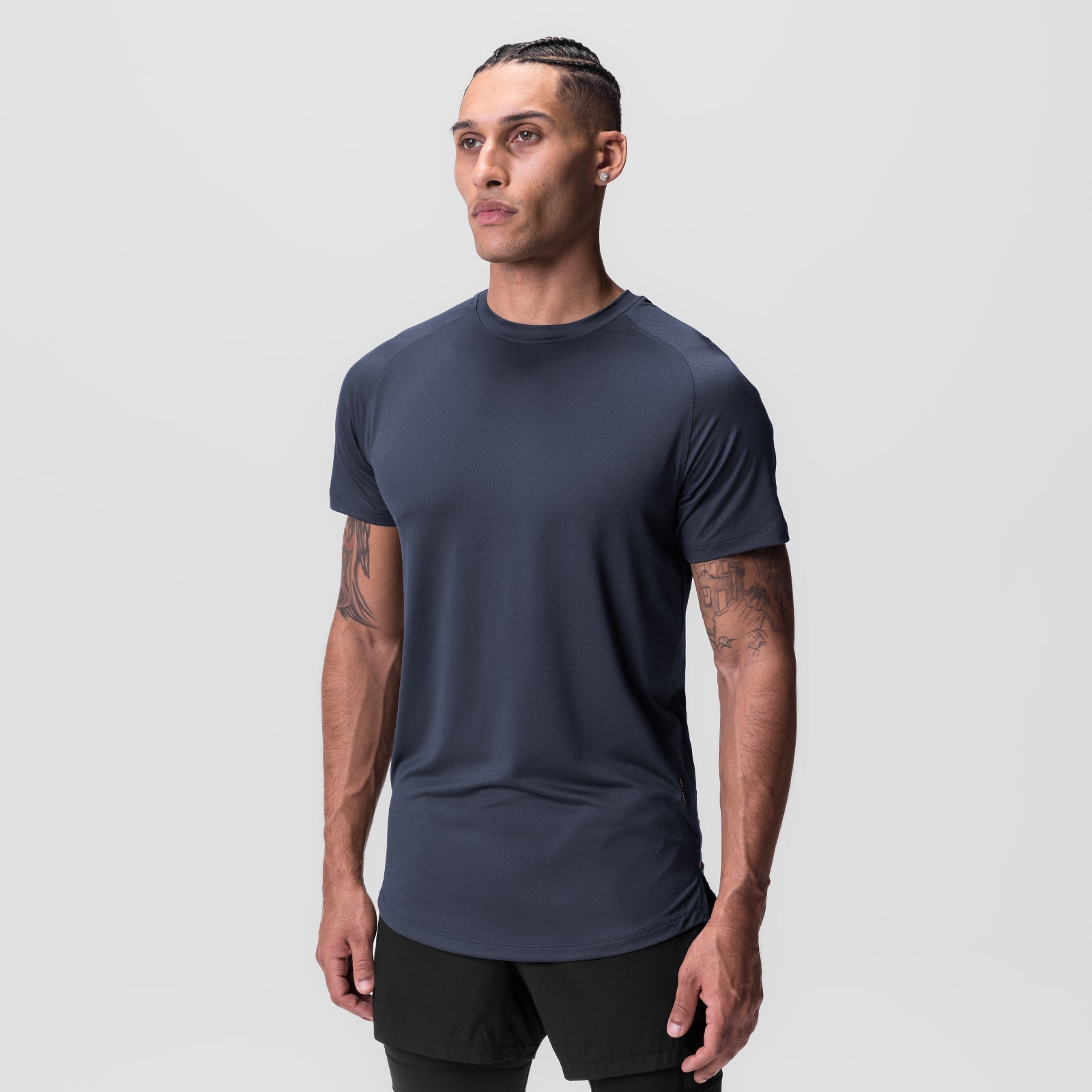 AeroSilver Established Tee in navy, worn by model facing forward