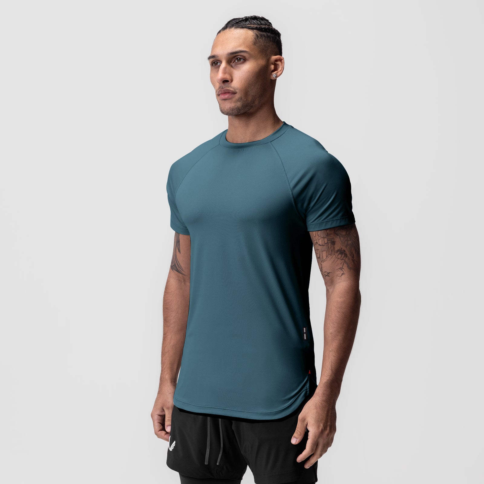 AeroSilver® Established Tee in storm blue, worn by model in three-quarter view