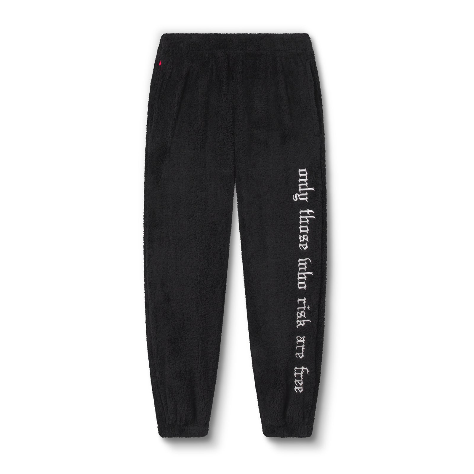 flatlay of black Sherpa Recovery Sweats joggers with white text on leg, front view