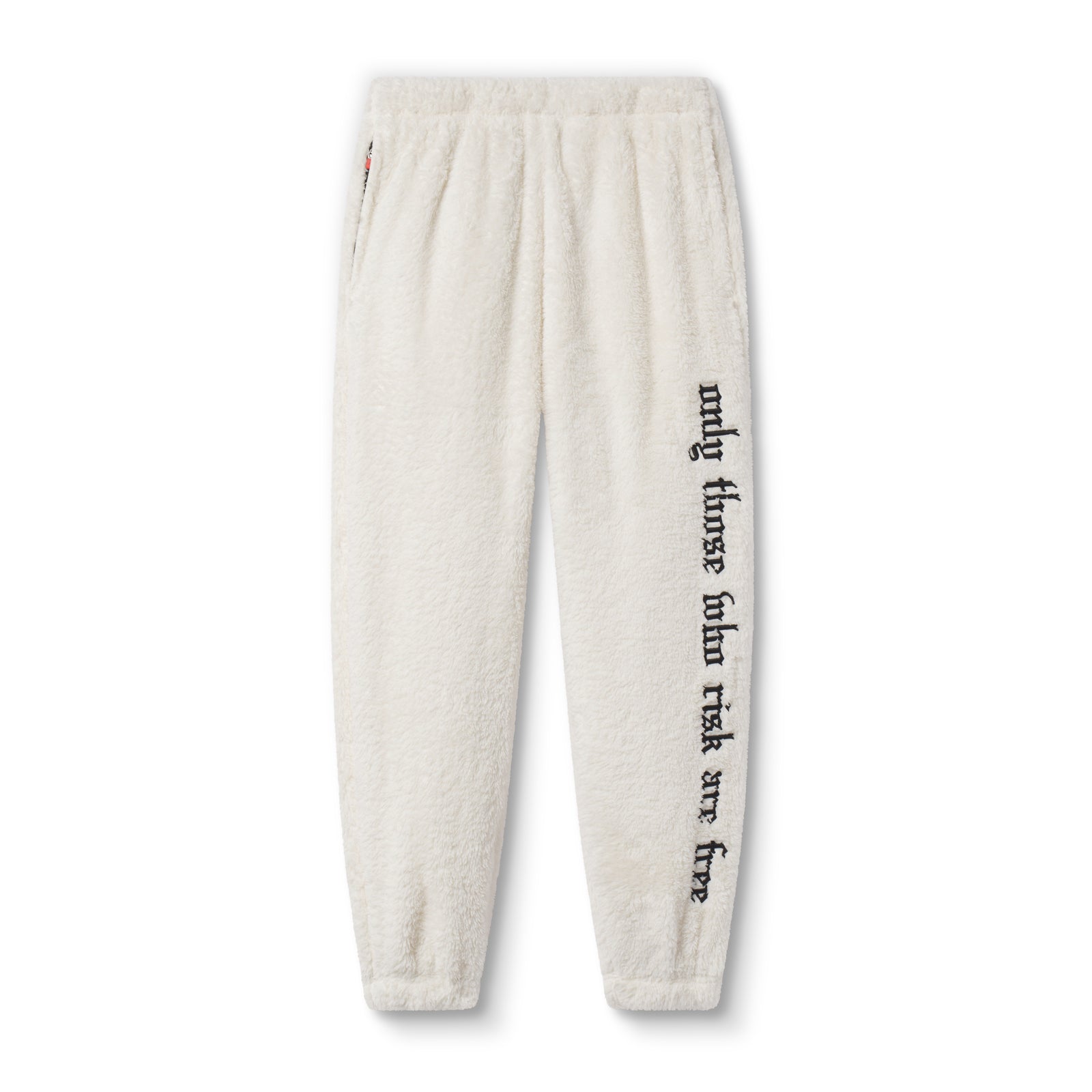 flatlay Sherpa Recovery Sweats joggers in ivory cream with black text on leg, front view