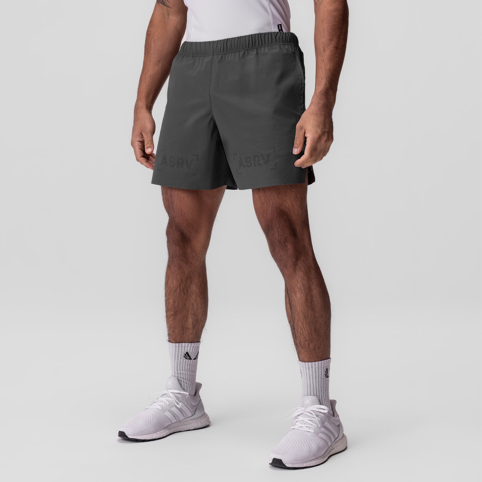 Ripstop 6" Perforated Short in space grey worn by model with white socks and sneakers