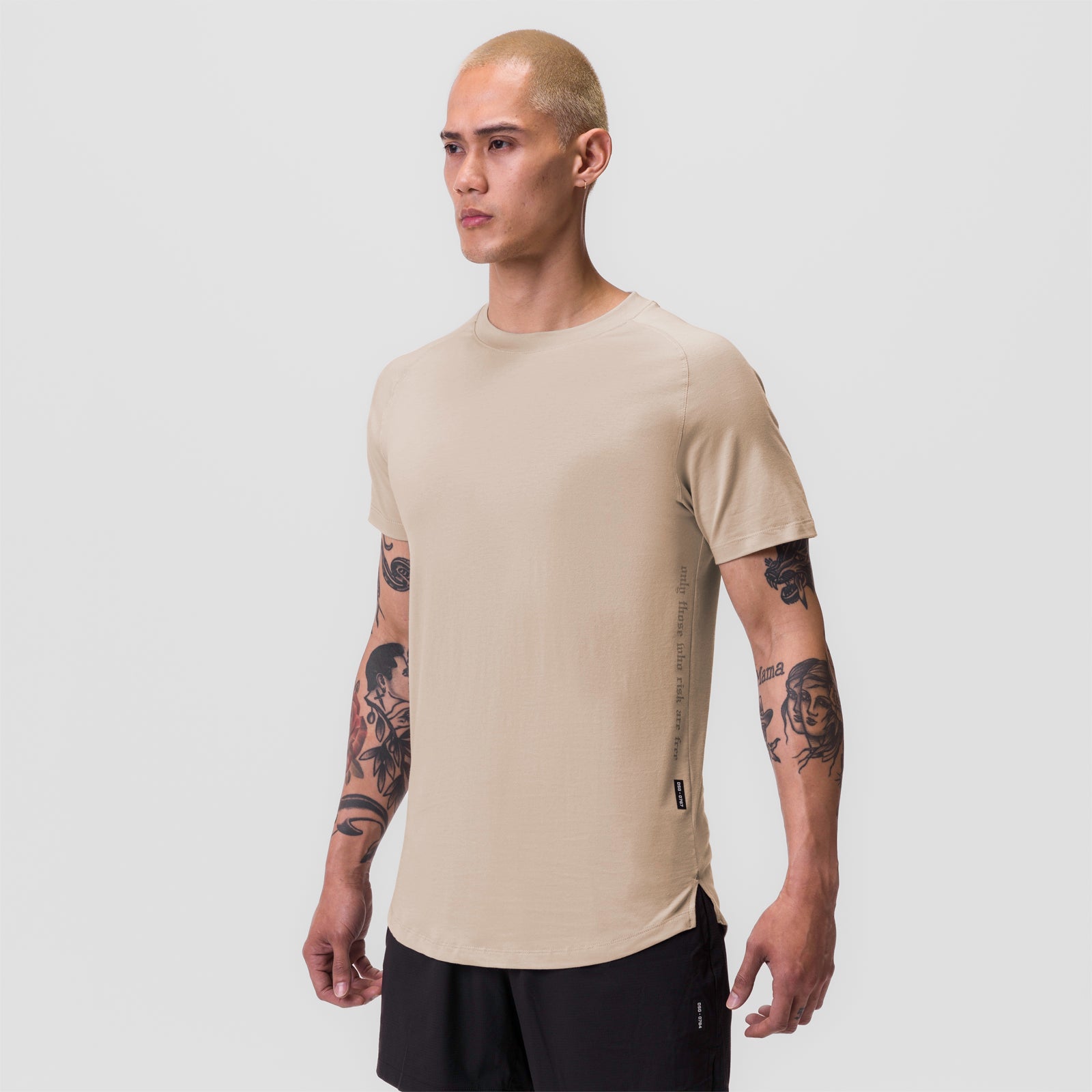 Beige Supima® Established Tee worn by male model, front view