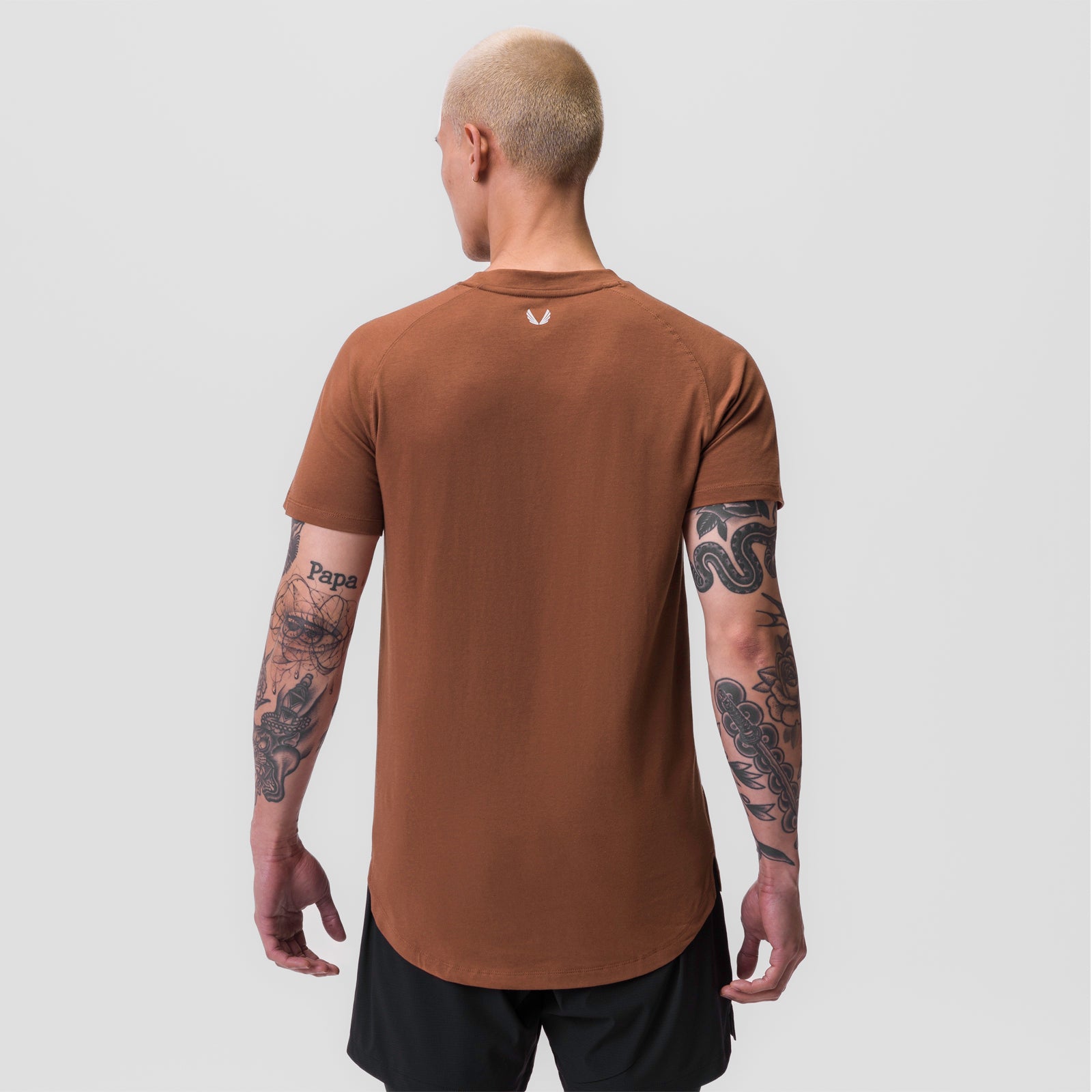 Rust Supima Established Tee worn by model, back view
