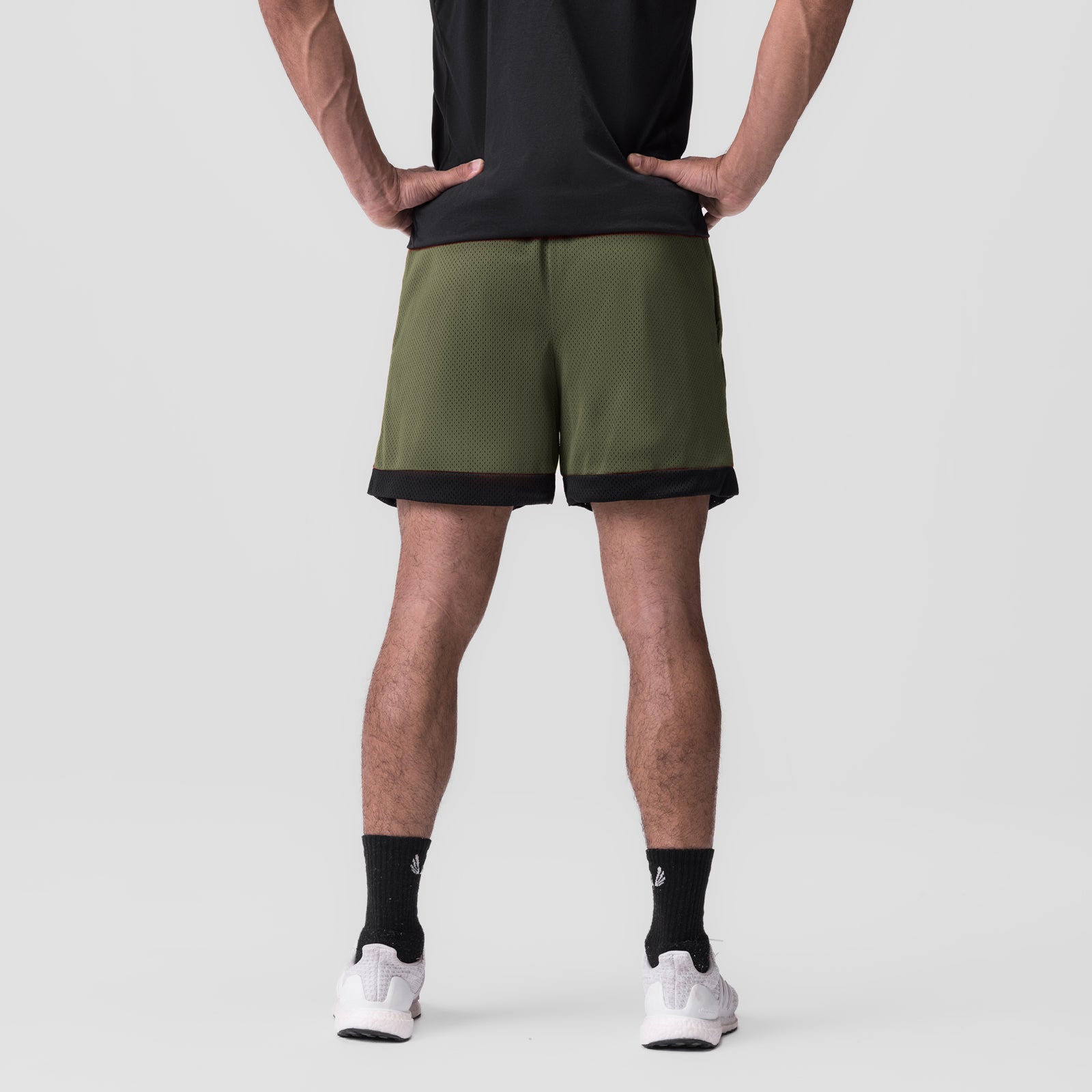 SilverPlus™ Mesh Reversible Short in Olive/Black, back view on model