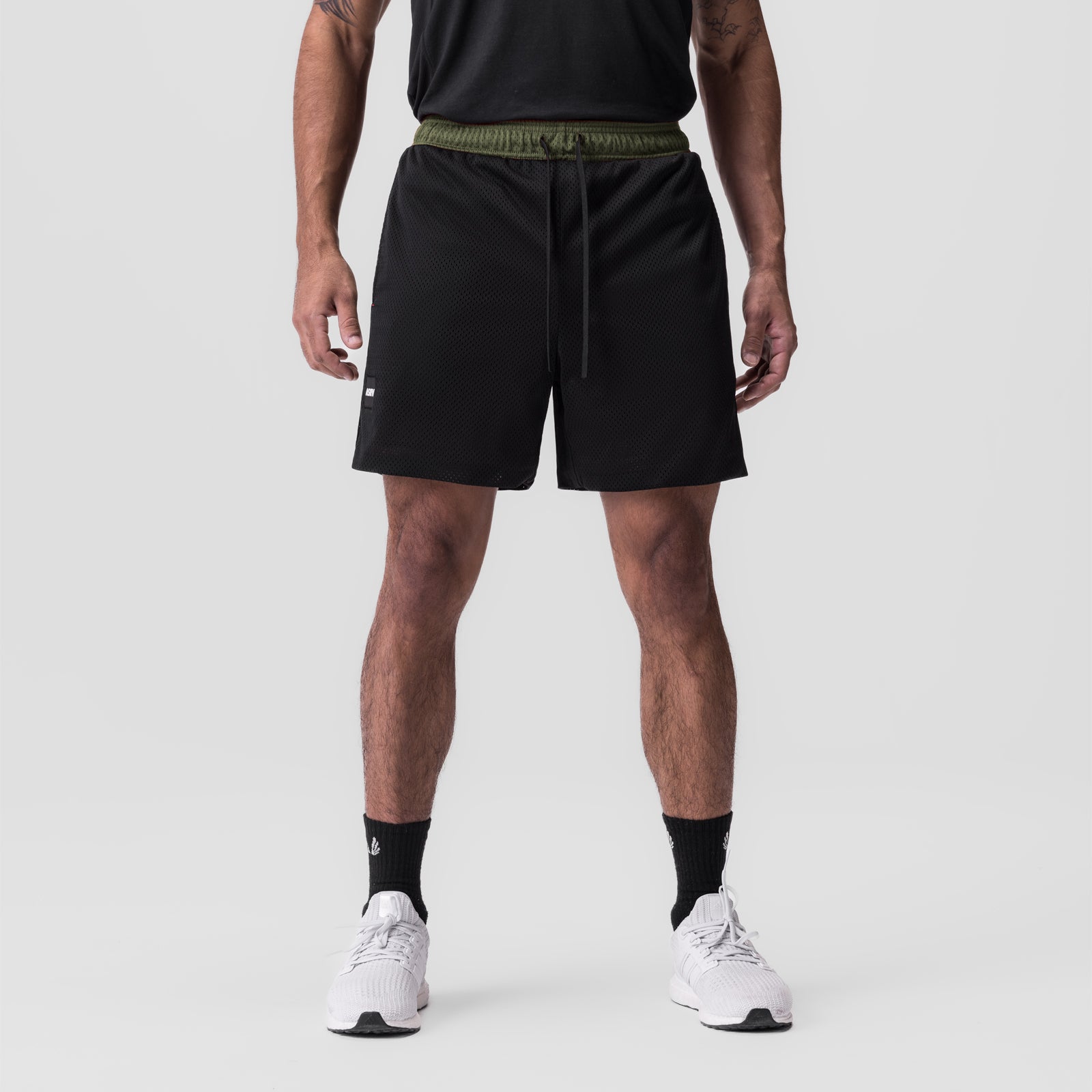 SilverPlus Mesh Reversible Short in Olive/Black, front view on model