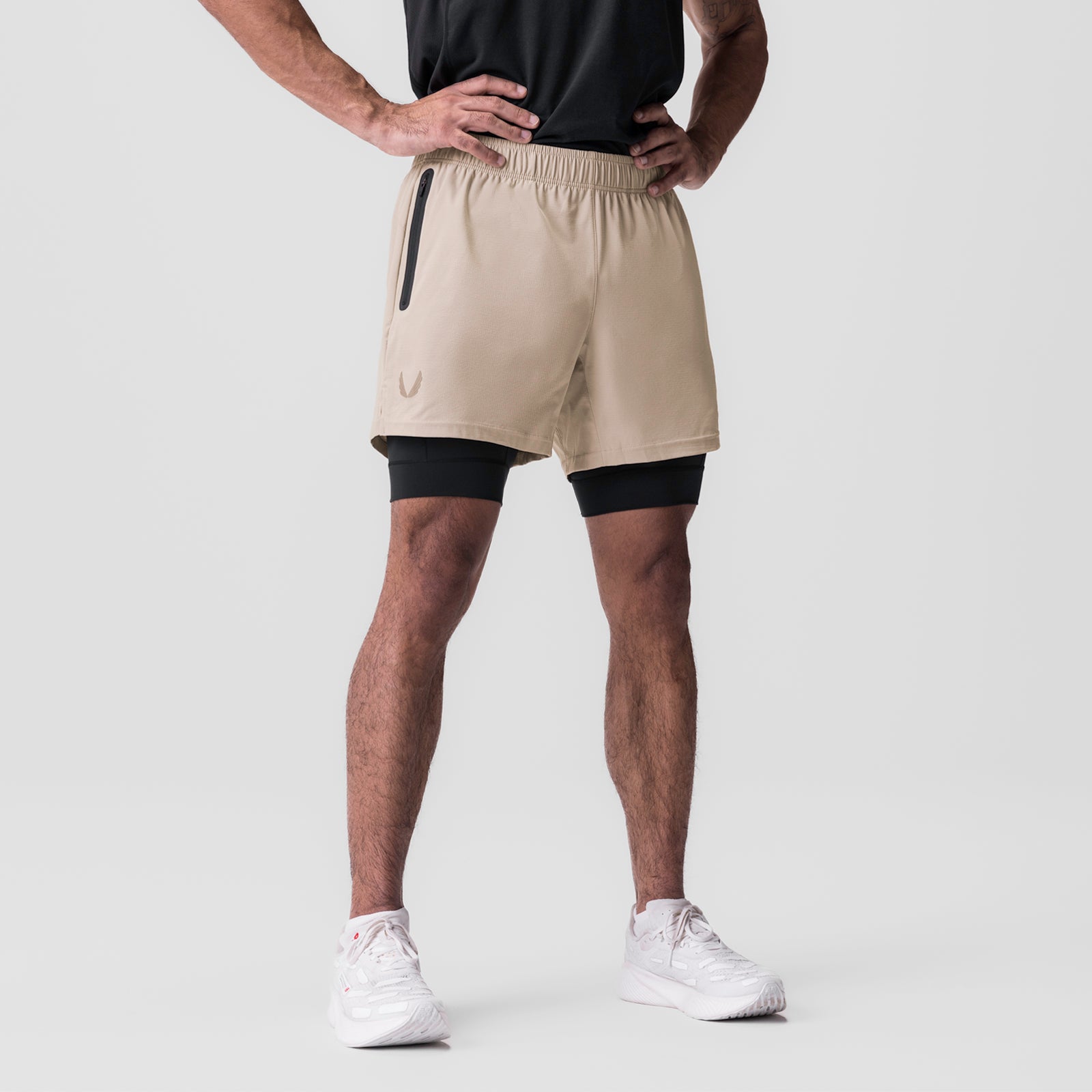 Ultralite 6" Liner Short in beige and black, worn by model, front view