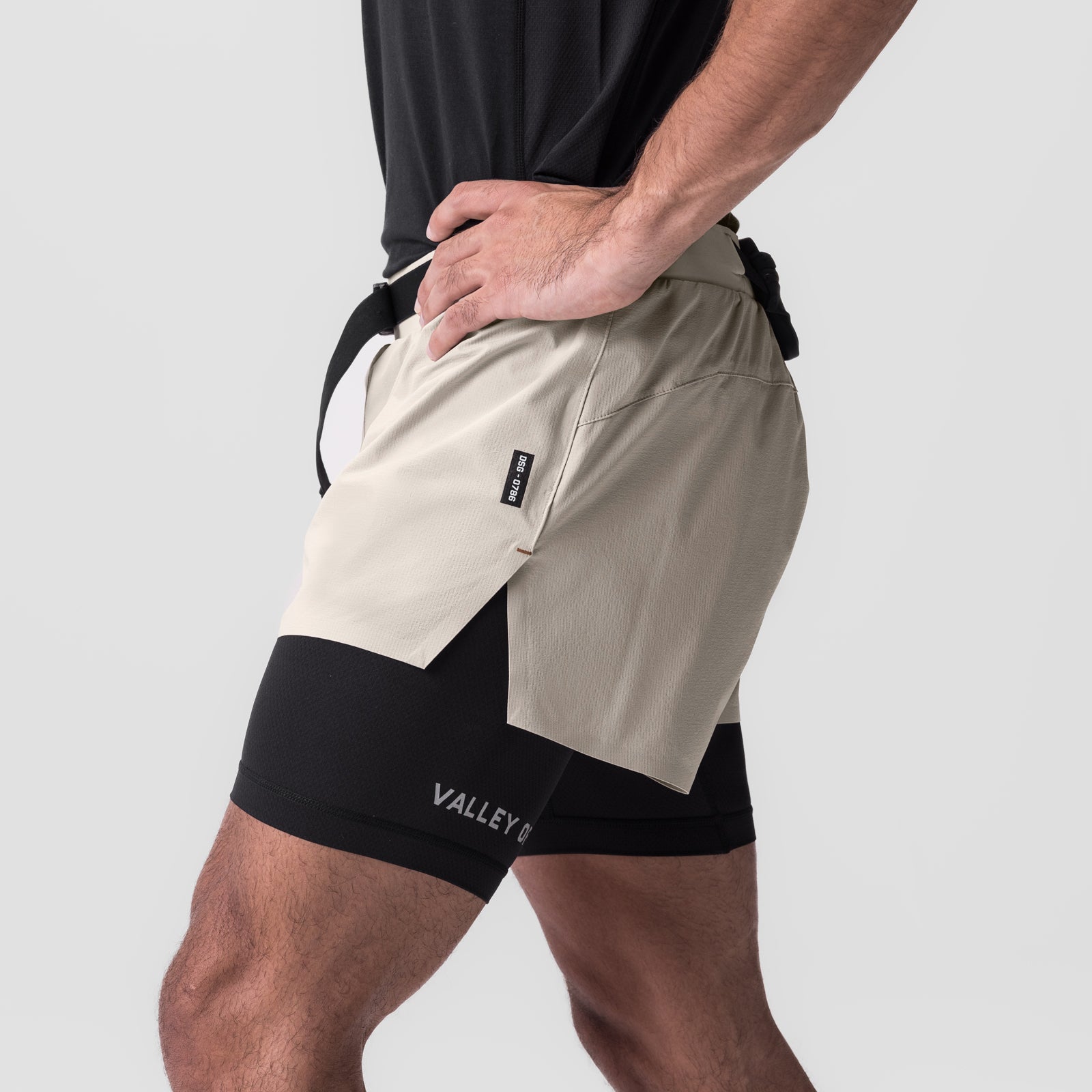 Ripstop 3" Belt Pack Short in beige and black, worn by model showing side view
