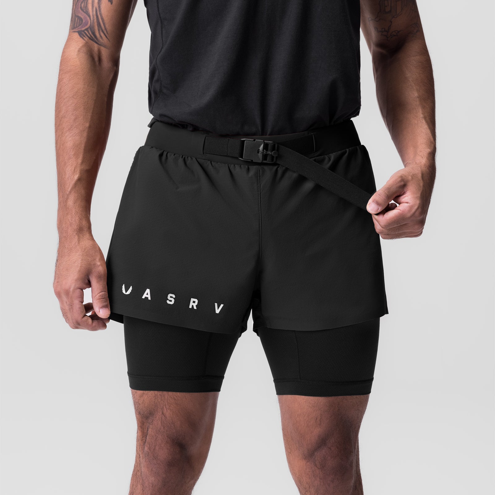 Ripstop 3" Belt Pack Short in black worn by model, front view with belt detail