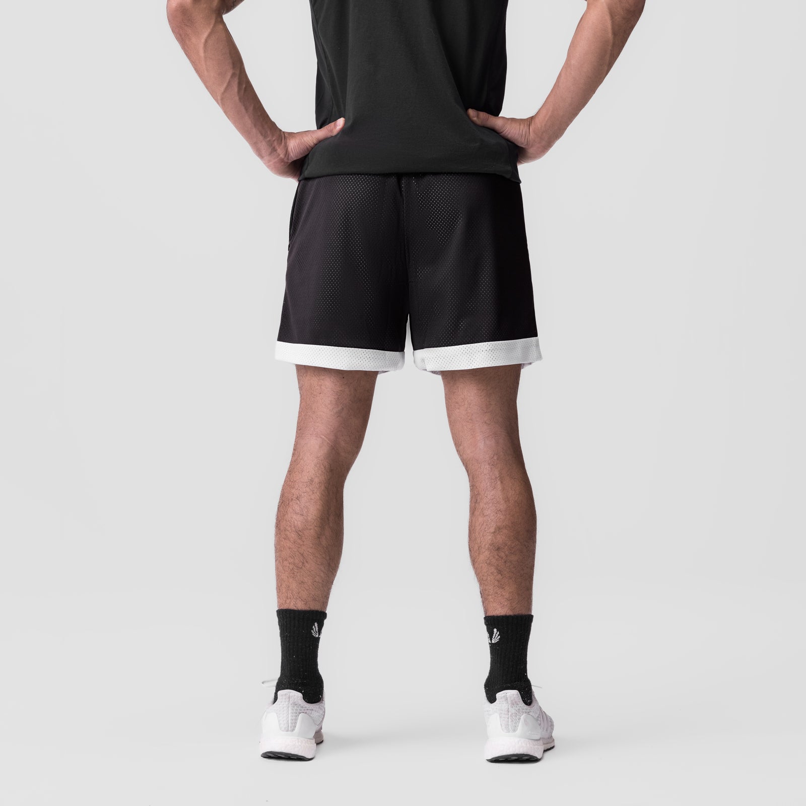 SilverPlus Mesh Reversible Shorts in Black/White, back view on model