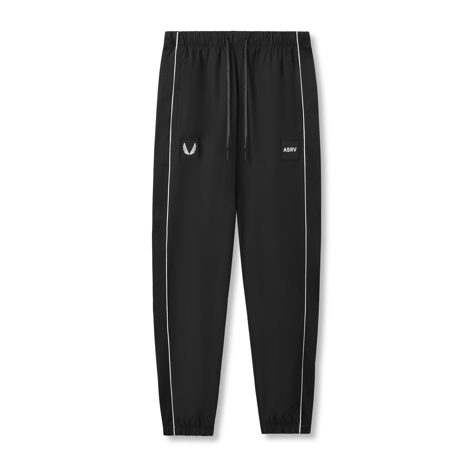 Flatlay of black ripstop oversized track pants with white piping and ASRV logo patch, front view